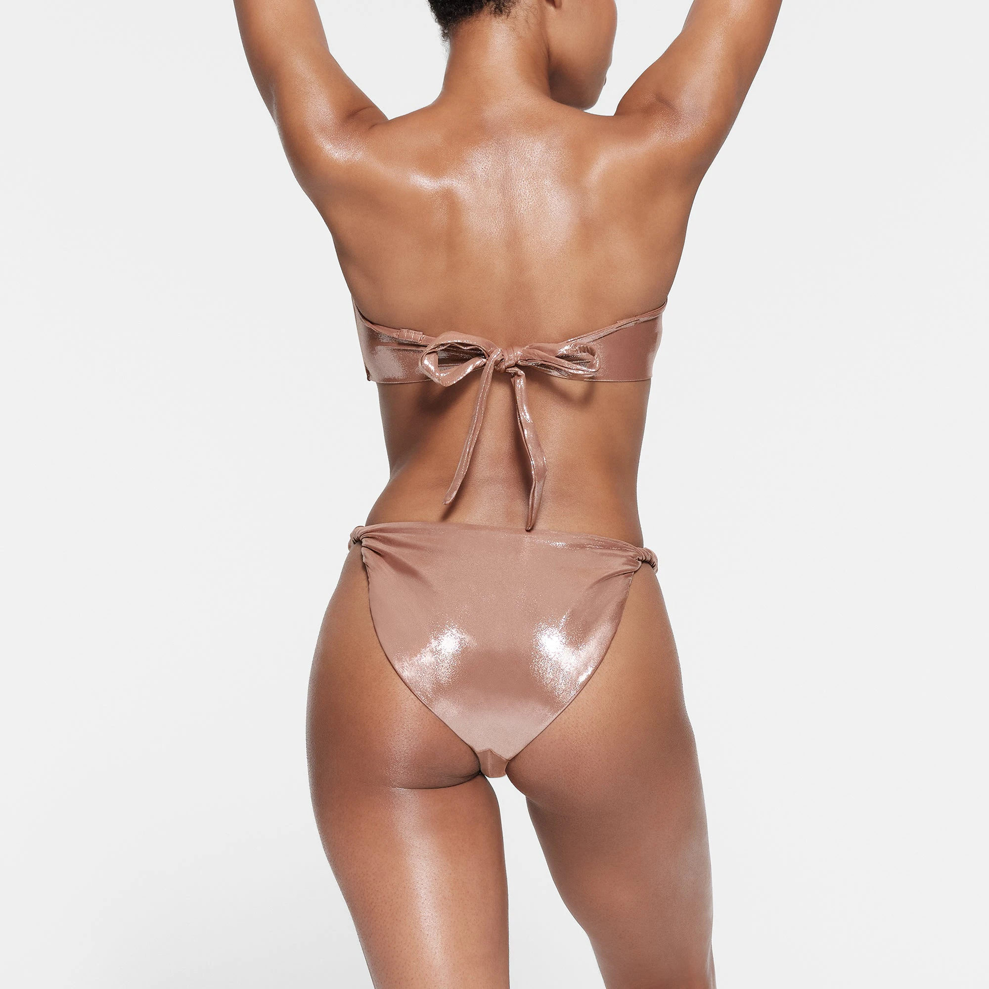 LIQUID SHINE SWIM TWISTED BOTTOM | CINNAMON ON A MODEL BACK VIEW