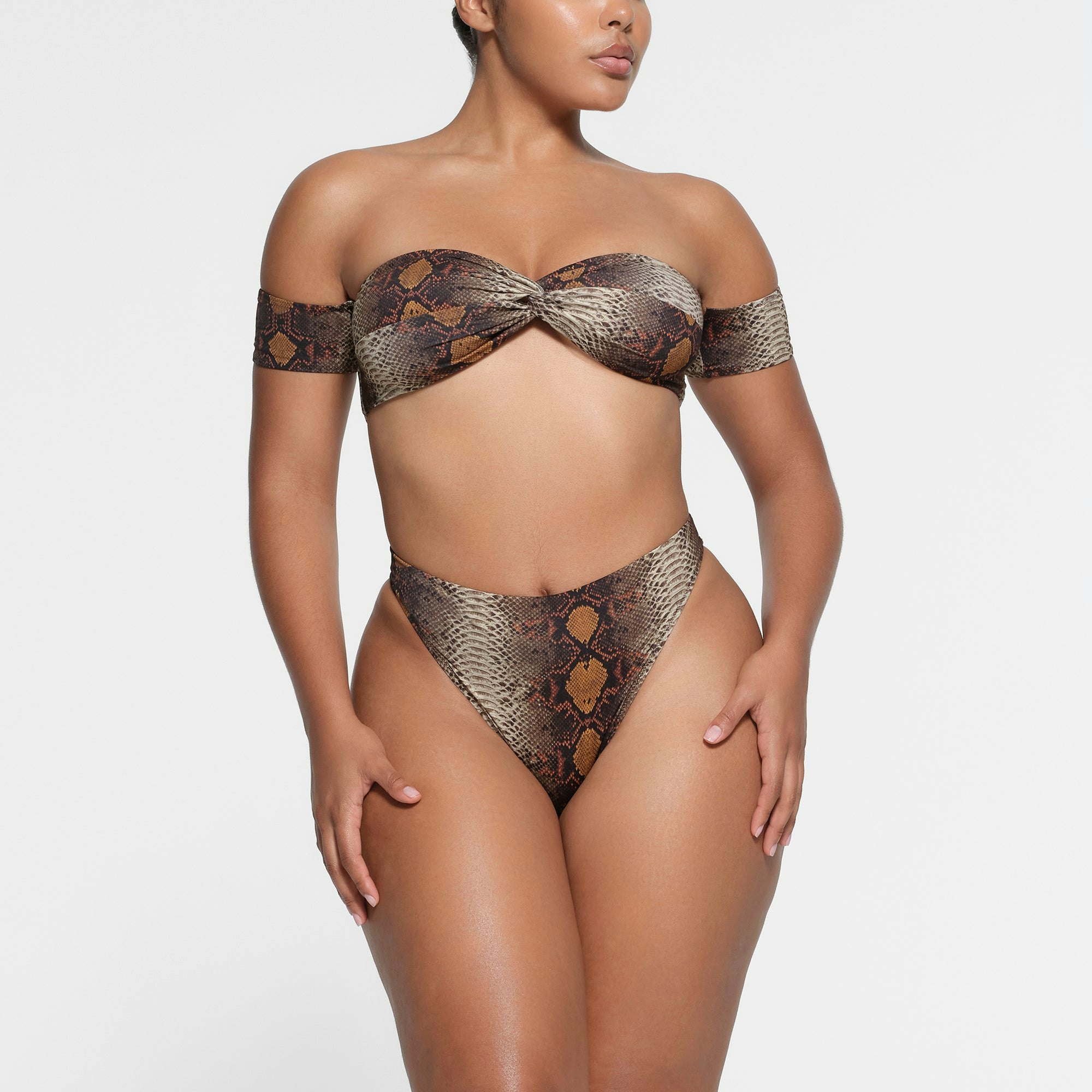 SIGNATURE SWIM HIGH LEG BIKINI BOTTOM | DESERT SNAKE PRINT ON A MODEL FRONT VIEW
