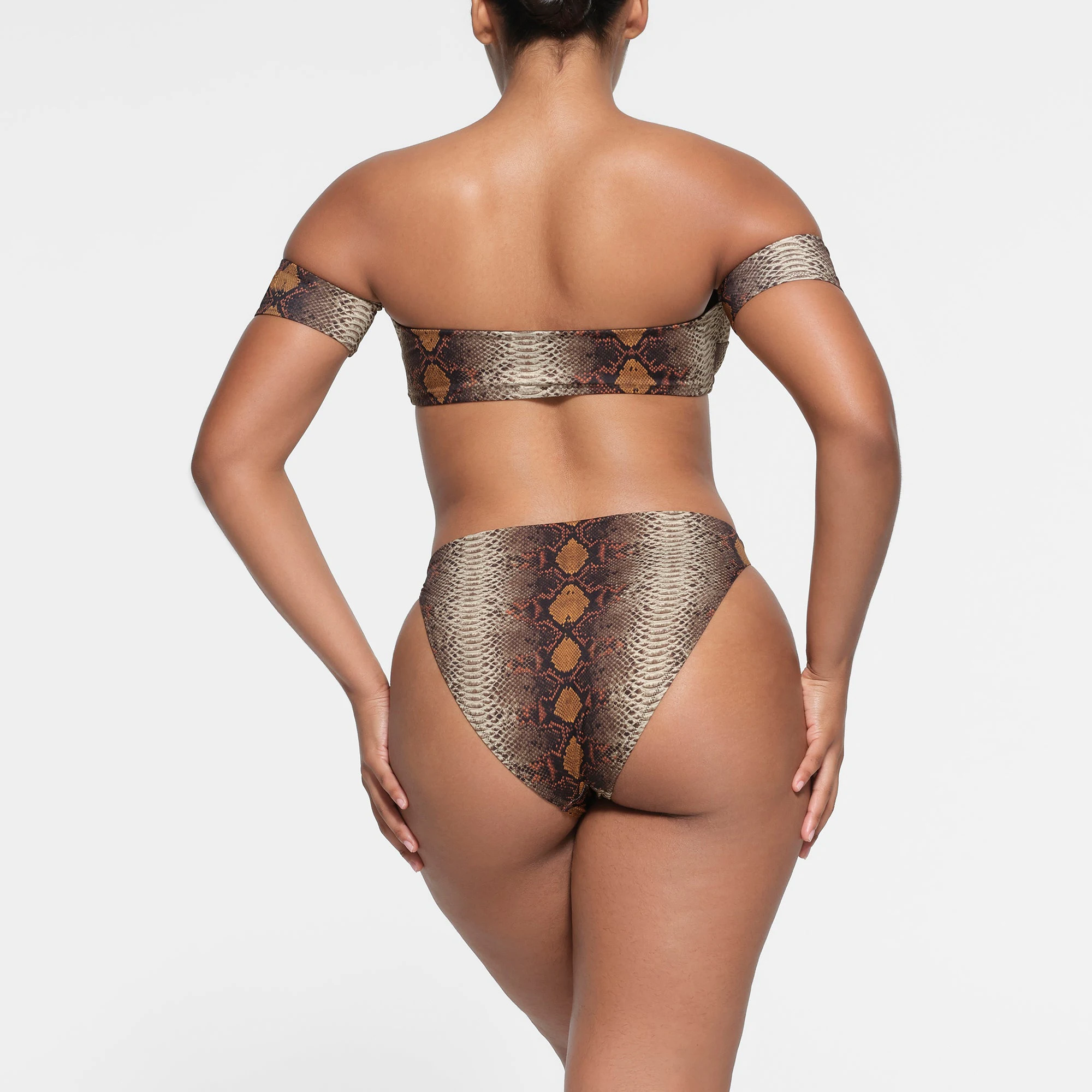 SIGNATURE SWIM HIGH LEG BIKINI BOTTOM | DESERT SNAKE PRINT ON A MODEL BACK VIEW