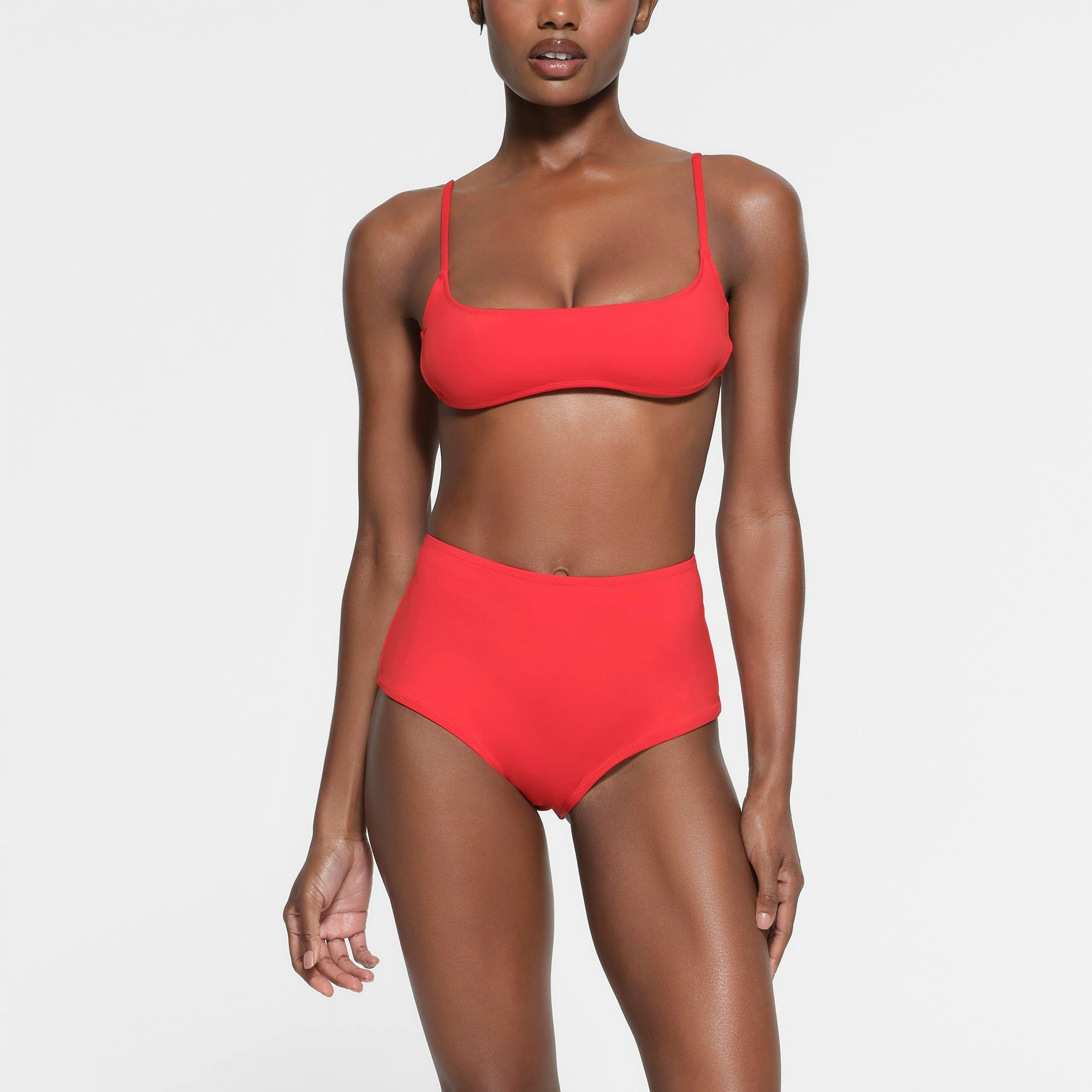 SIGNATURE SWIM HIGH-WAISTED FULL BRIEF ON A MODEL FRONT VIEW
