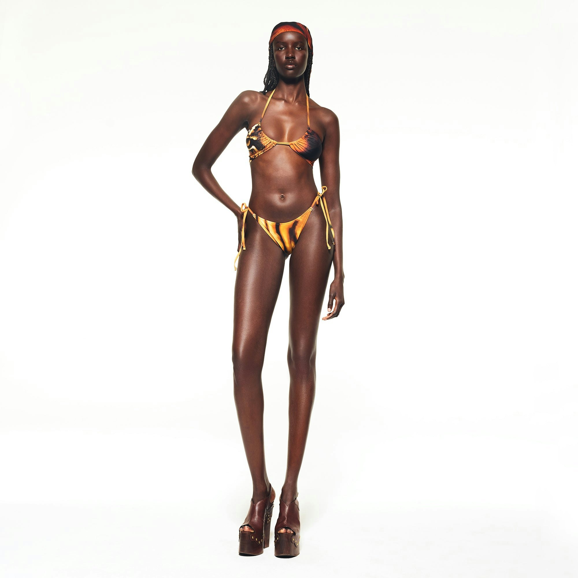 ROBERTO CAVALLI X SKIMS DIPPED TIE BIKINI BOTTOM | TIGER FACE PRINT ON A MODEL FRONT VIEW | FOCUS: 0.0, 1.0, 0.9