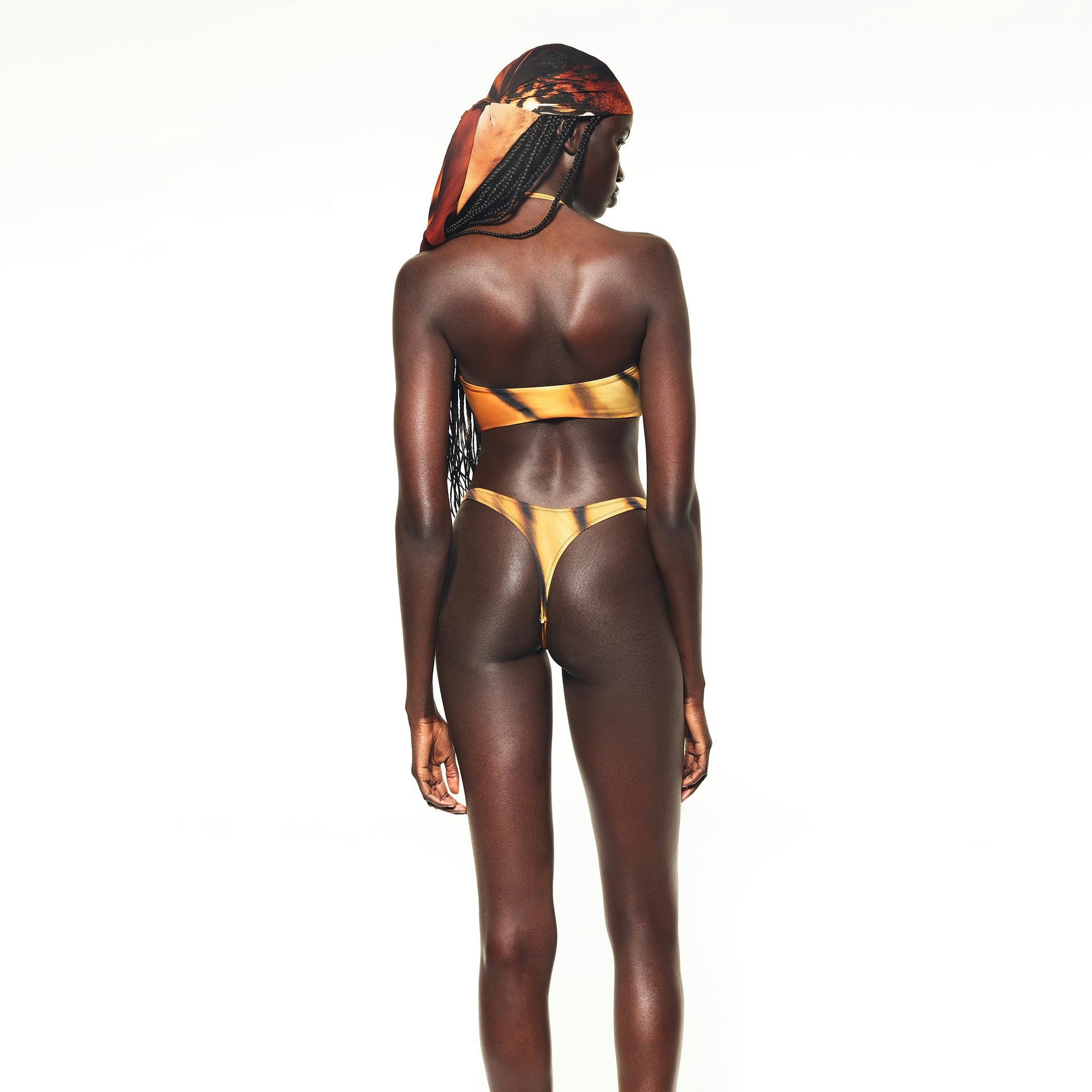 ROBERTO CAVALLI X SKIMS THONG BIKINI BOTTOM | TIGER FACE PRINT ON A MODEL BACK VIEW | FOCUS: 0.0, 1.0, 0.9