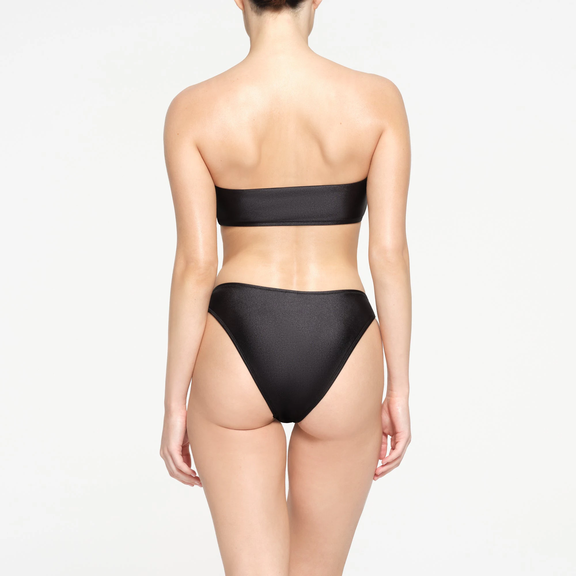 SHINE SWIM TANGA BOTTOMS | ONYX ON A MODEL BACK VIEW