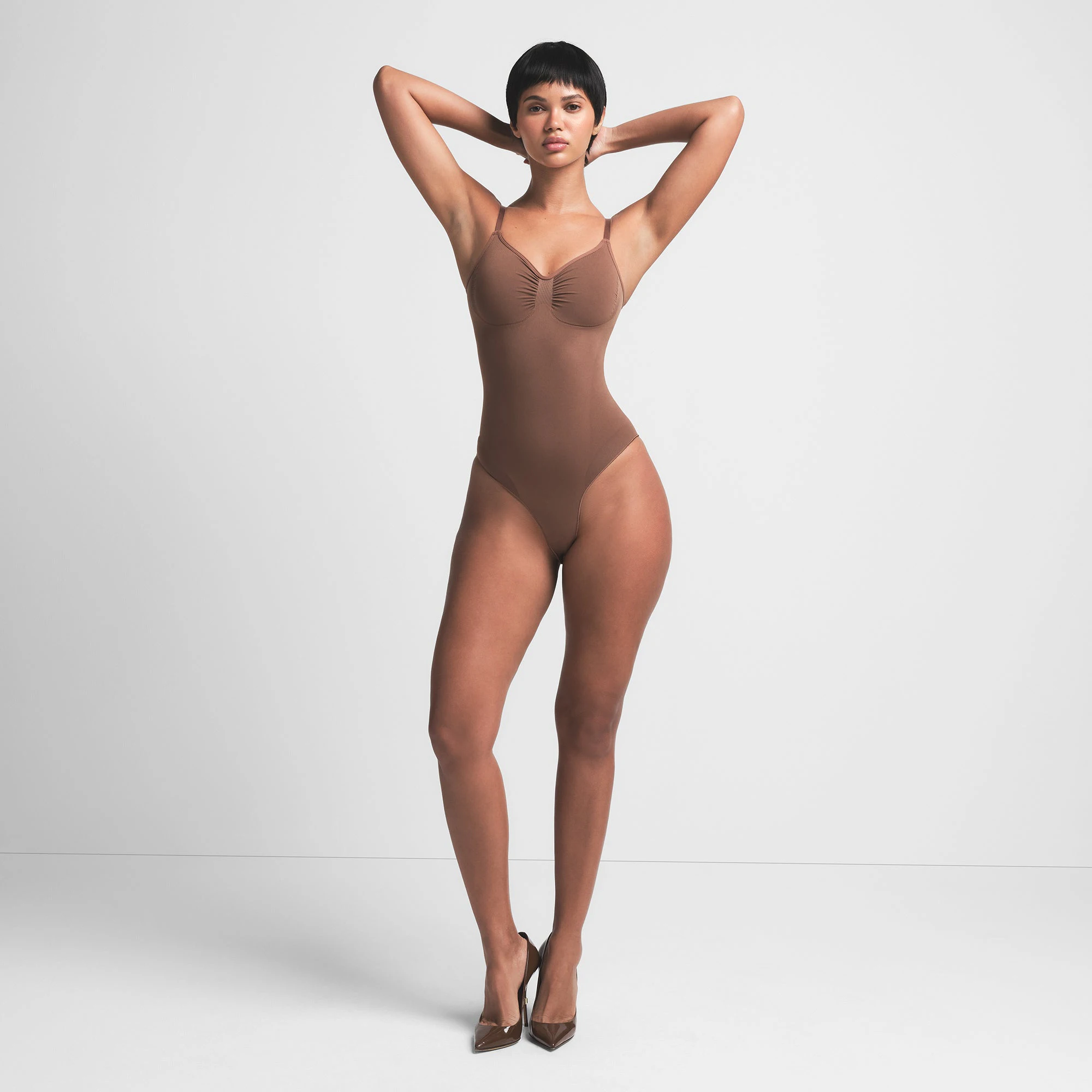 SEAMLESS SCULPT BRIEF BODYSUIT | JASPER ON A MODEL FRONT VIEW