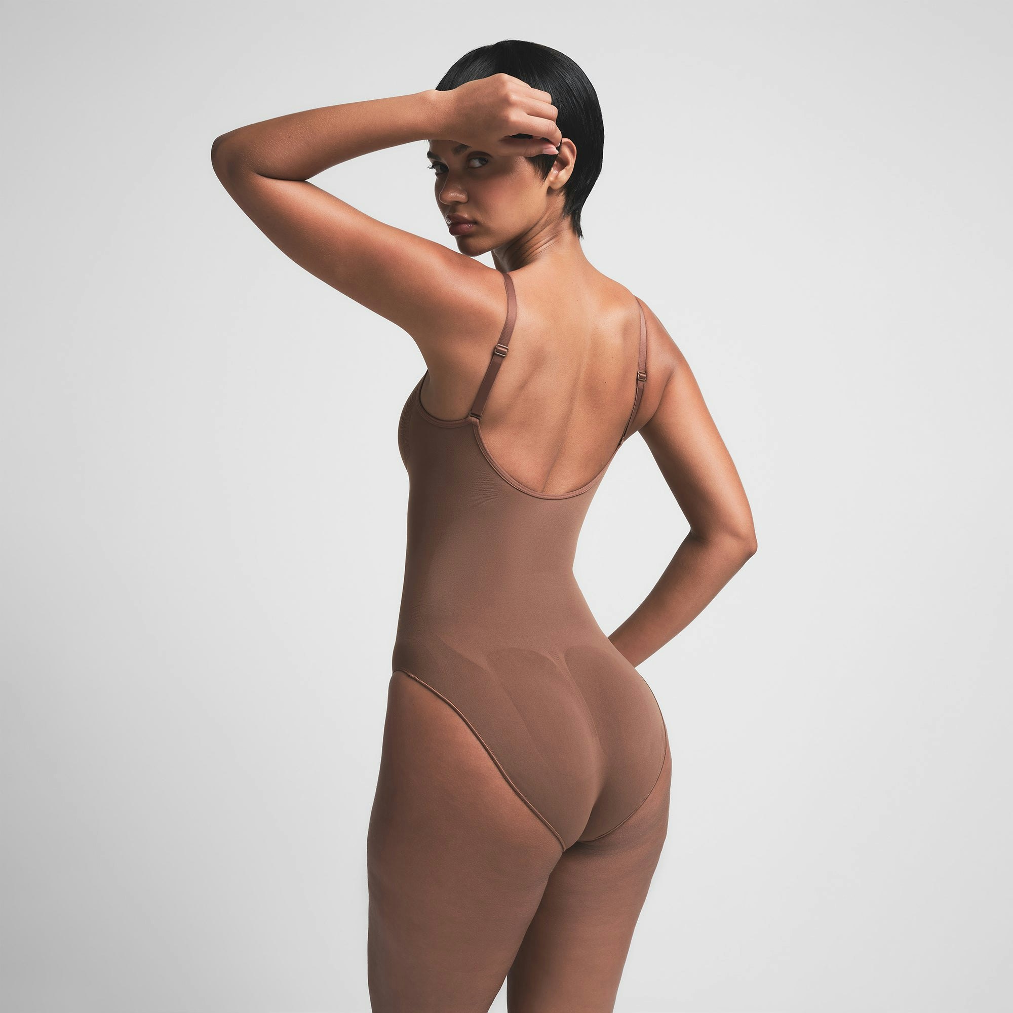 SEAMLESS SCULPT BRIEF BODYSUIT | JASPER ON A MODEL BACK VIEW | FOCUS: 0.0, 1.0, 0.9