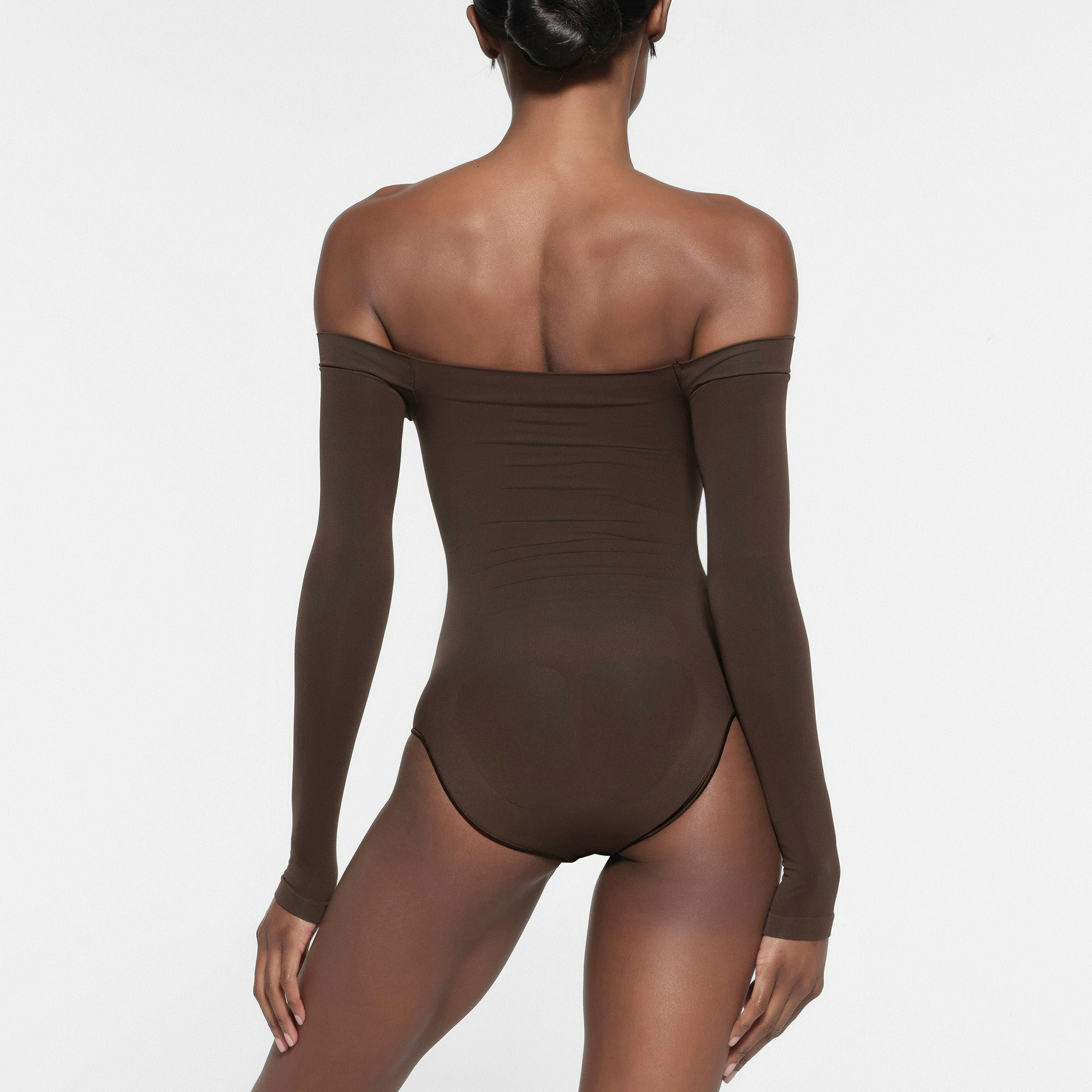 SEAMLESS SCULPT OFF THE SHOULDER BRIEF BODYSUIT | ESPRESSO ON A MODEL BACK VIEW