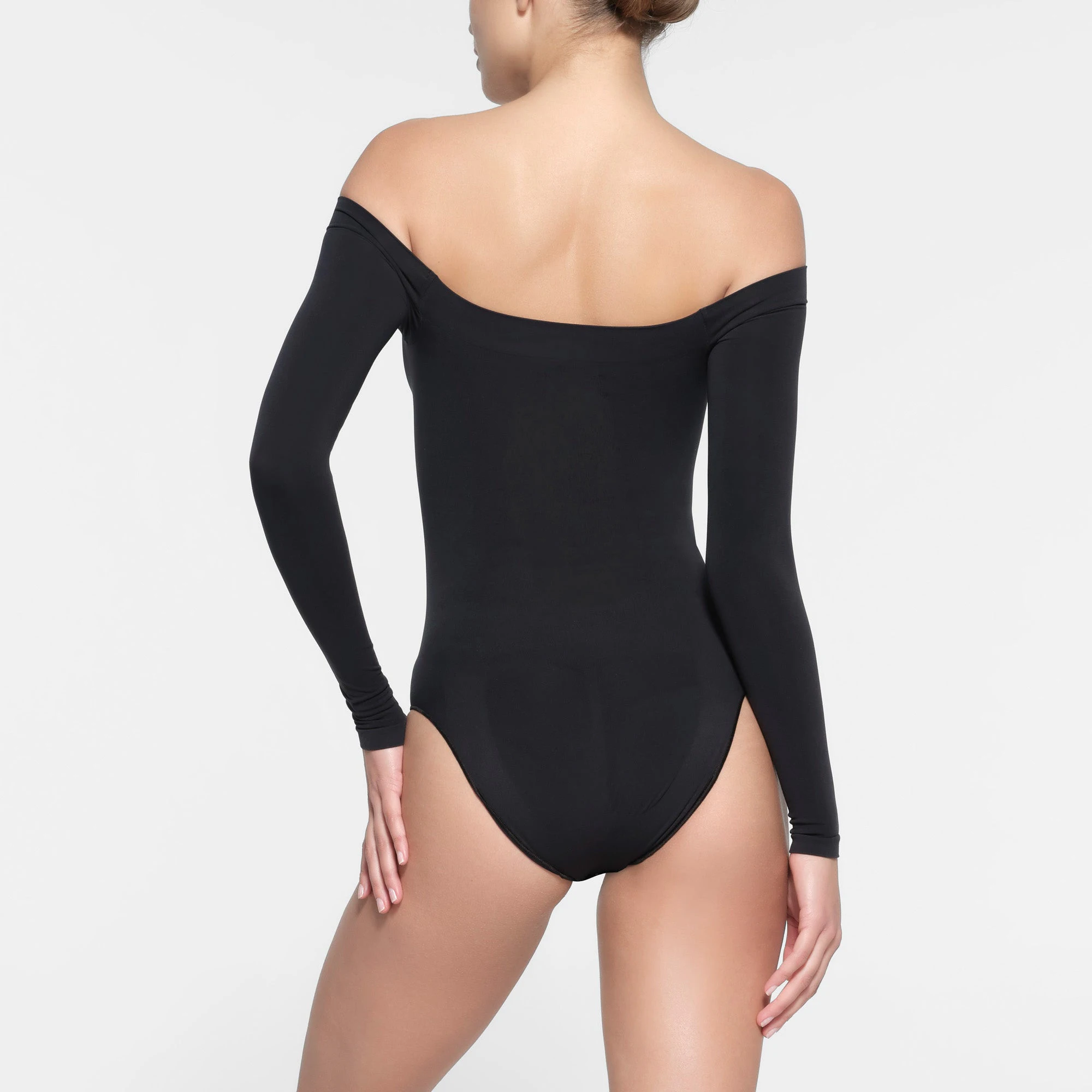 SEAMLESS SCULPT OFF THE SHOULDER BRIEF BODYSUIT | ONYX ON A MODEL BACK VIEW