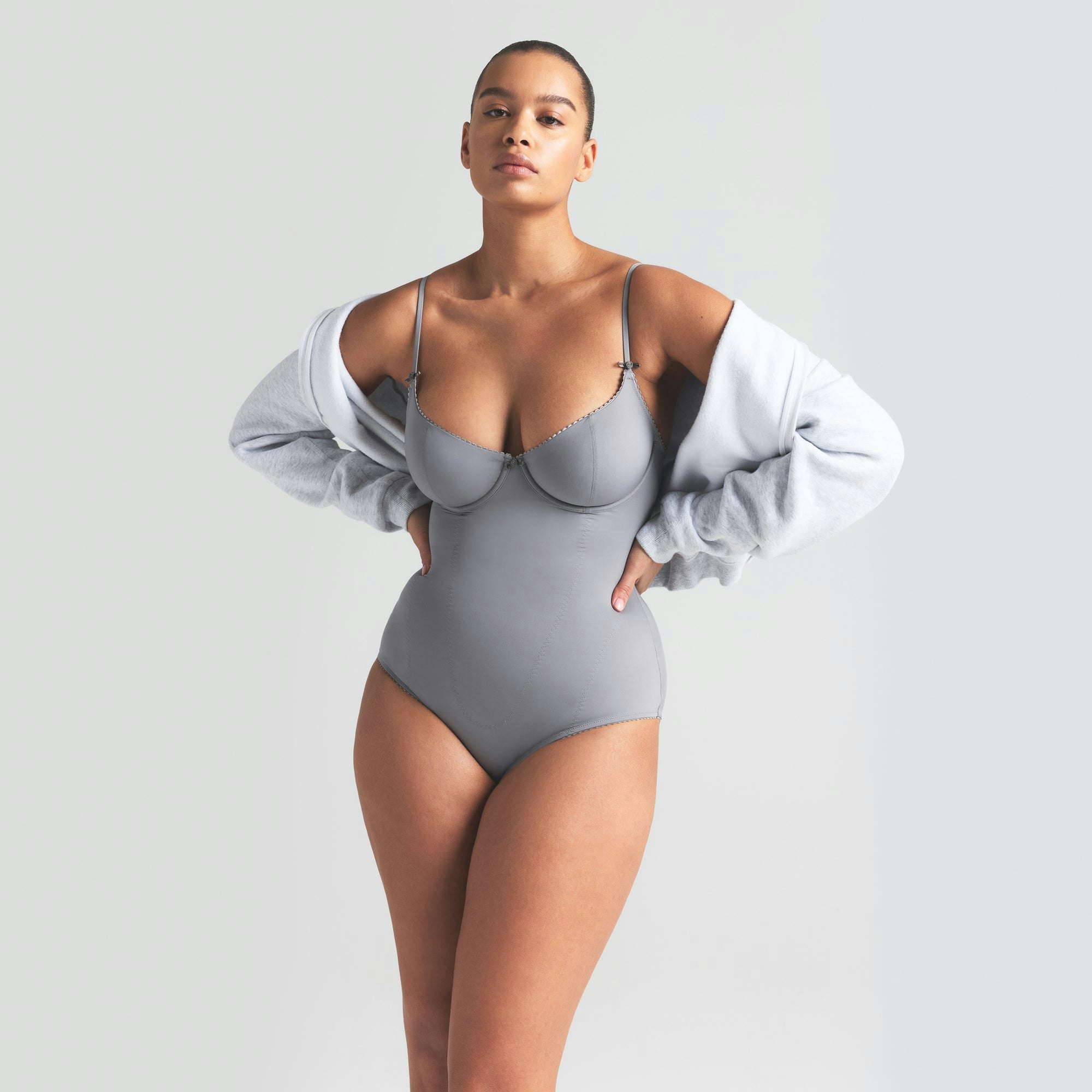 VINTAGE SHAPEWEAR BRIEF BODYSUIT | SHADOW ON A MODEL SIDE VIEW | FOCUS: 0.0, 1.0, 0.9