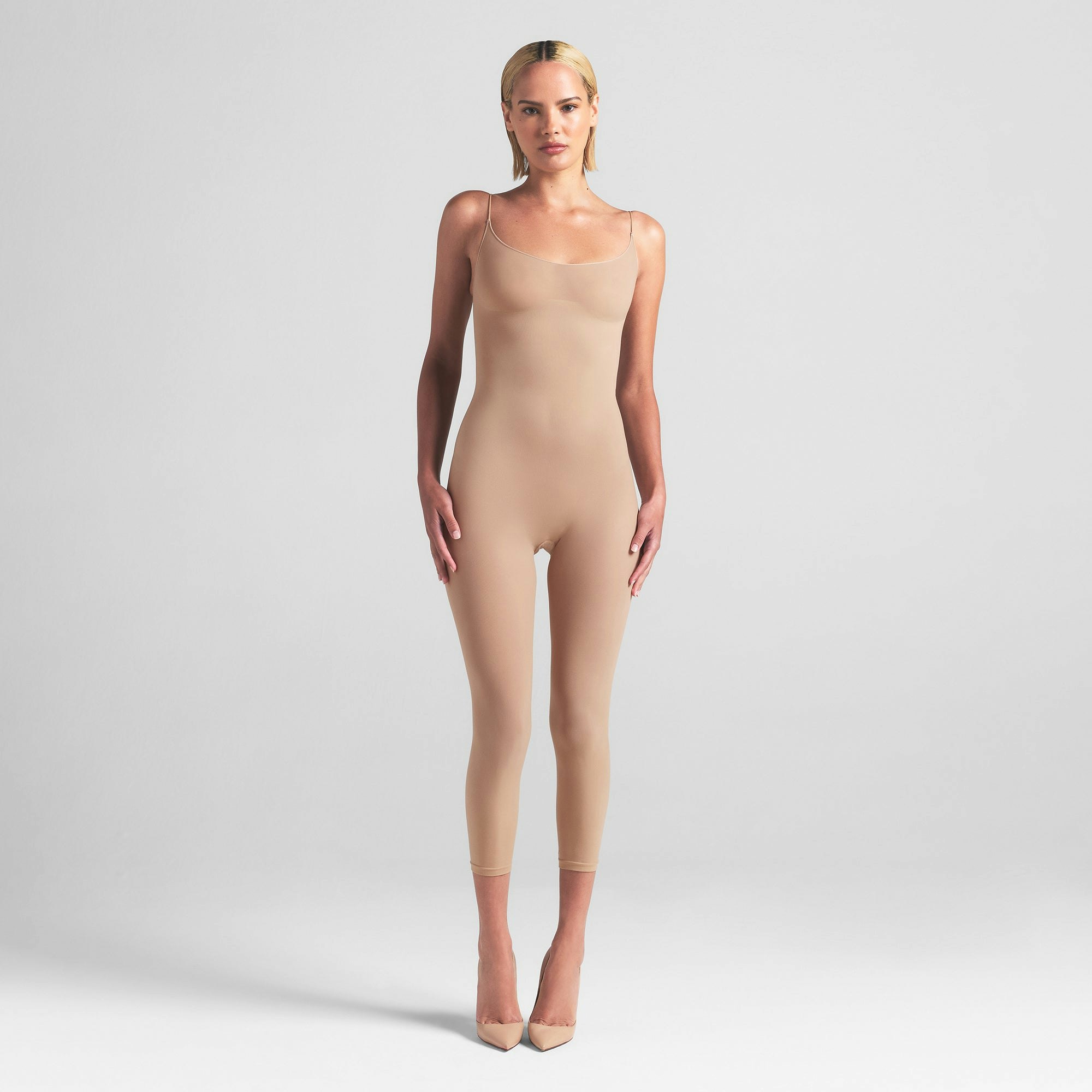 SHEER SEAMLESS CATSUIT | CLAY ON A MODEL FRONT VIEW | FOCUS: 0.0, 1.0, 0.9