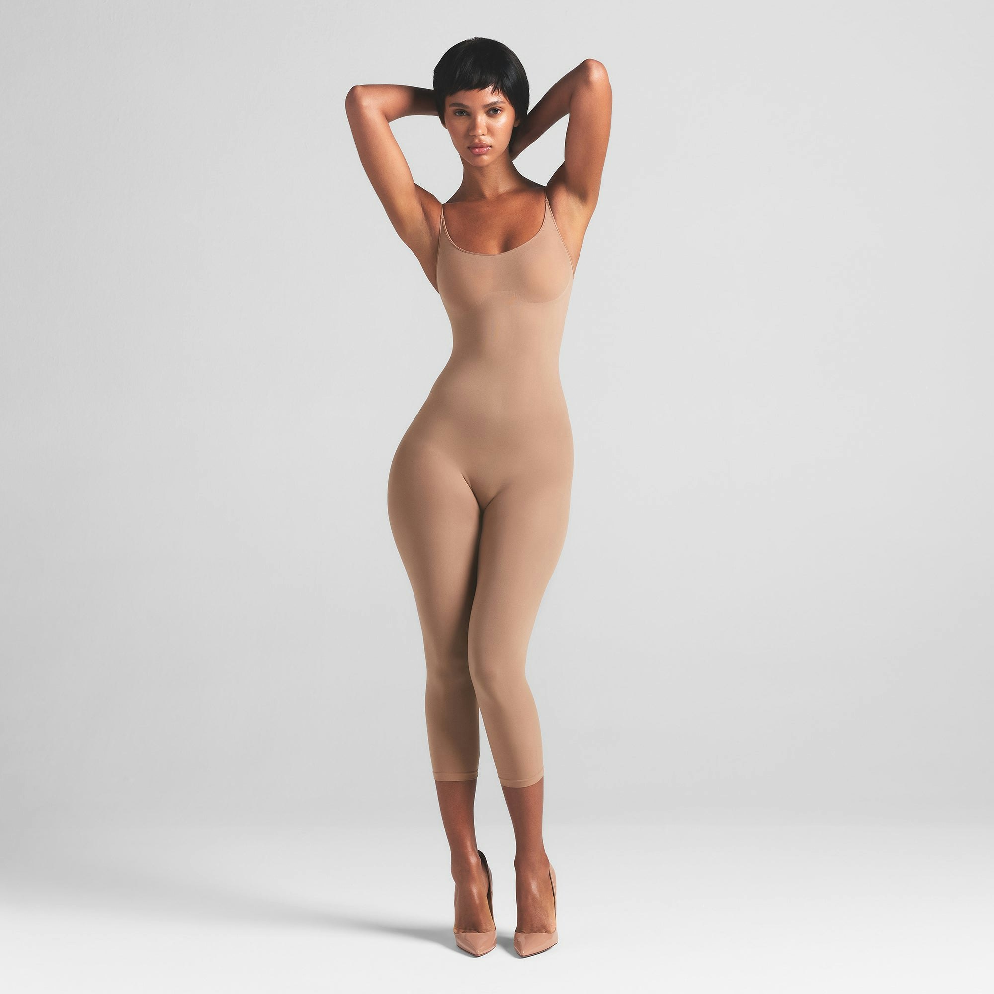 SHEER SEAMLESS CATSUIT | SIENNA ON A MODEL FRONT VIEW | FOCUS: 0.0, 1.0, 0.9