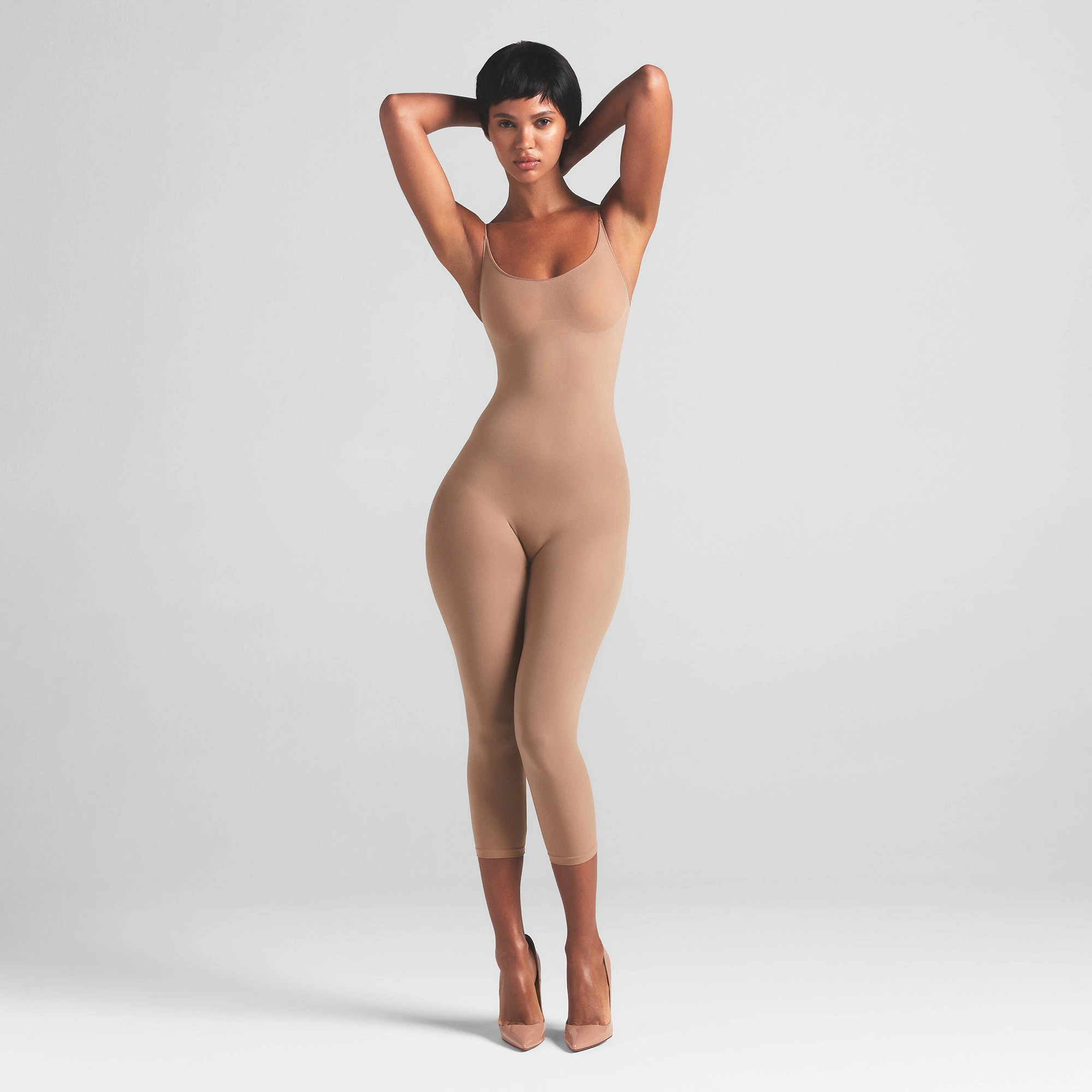 SHEER SEAMLESS CATSUIT | SIENNA ON A MODEL FRONT VIEW | FOCUS: 0.0, 1.0, 0.9