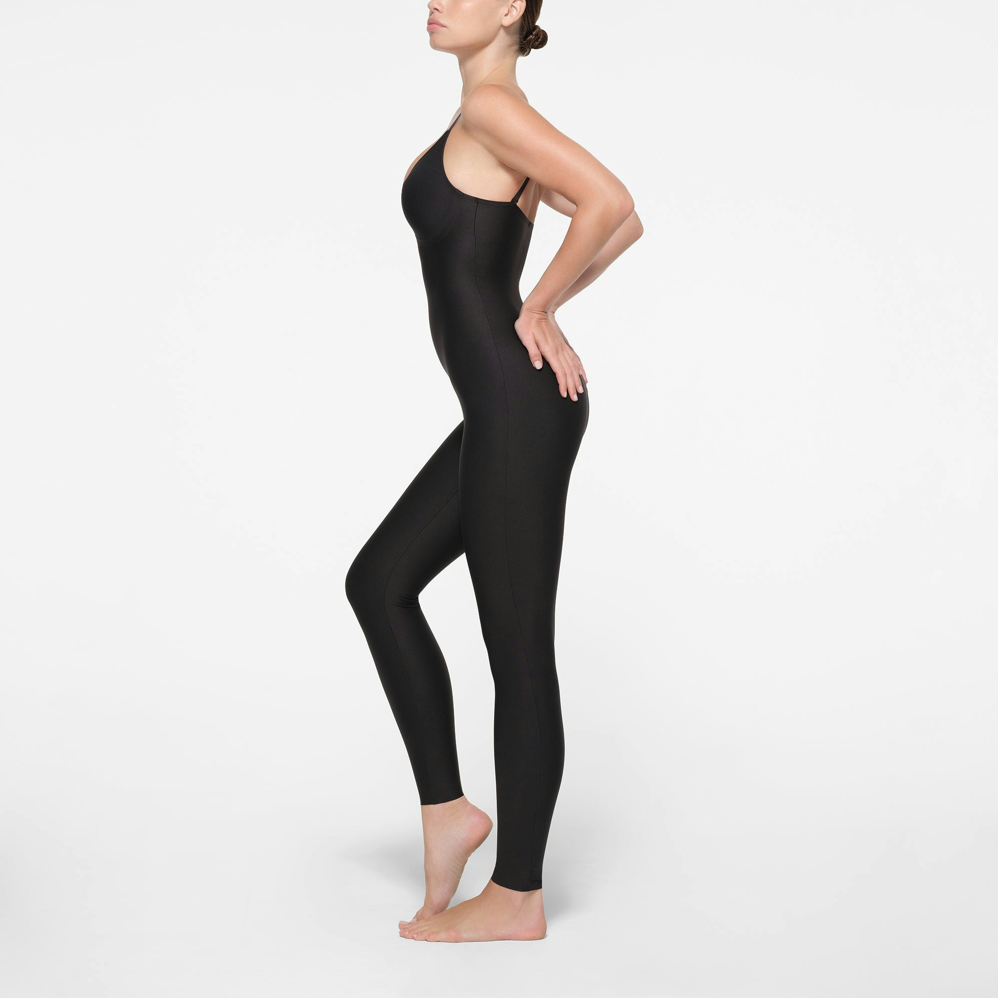 SKIMS BODY PUSH-UP CATSUIT | ONYX ON A MODEL SIDE VIEW