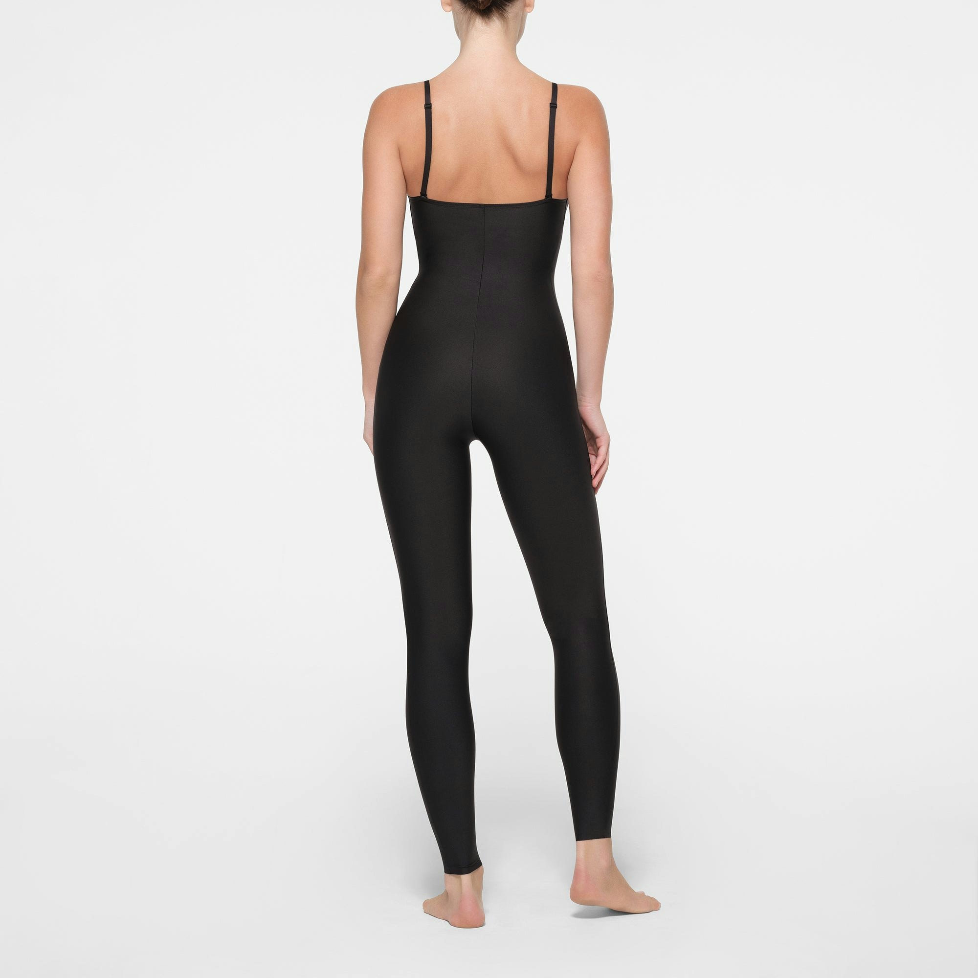 SKIMS BODY PUSH-UP CATSUIT | ONYX ON A MODEL BACK VIEW