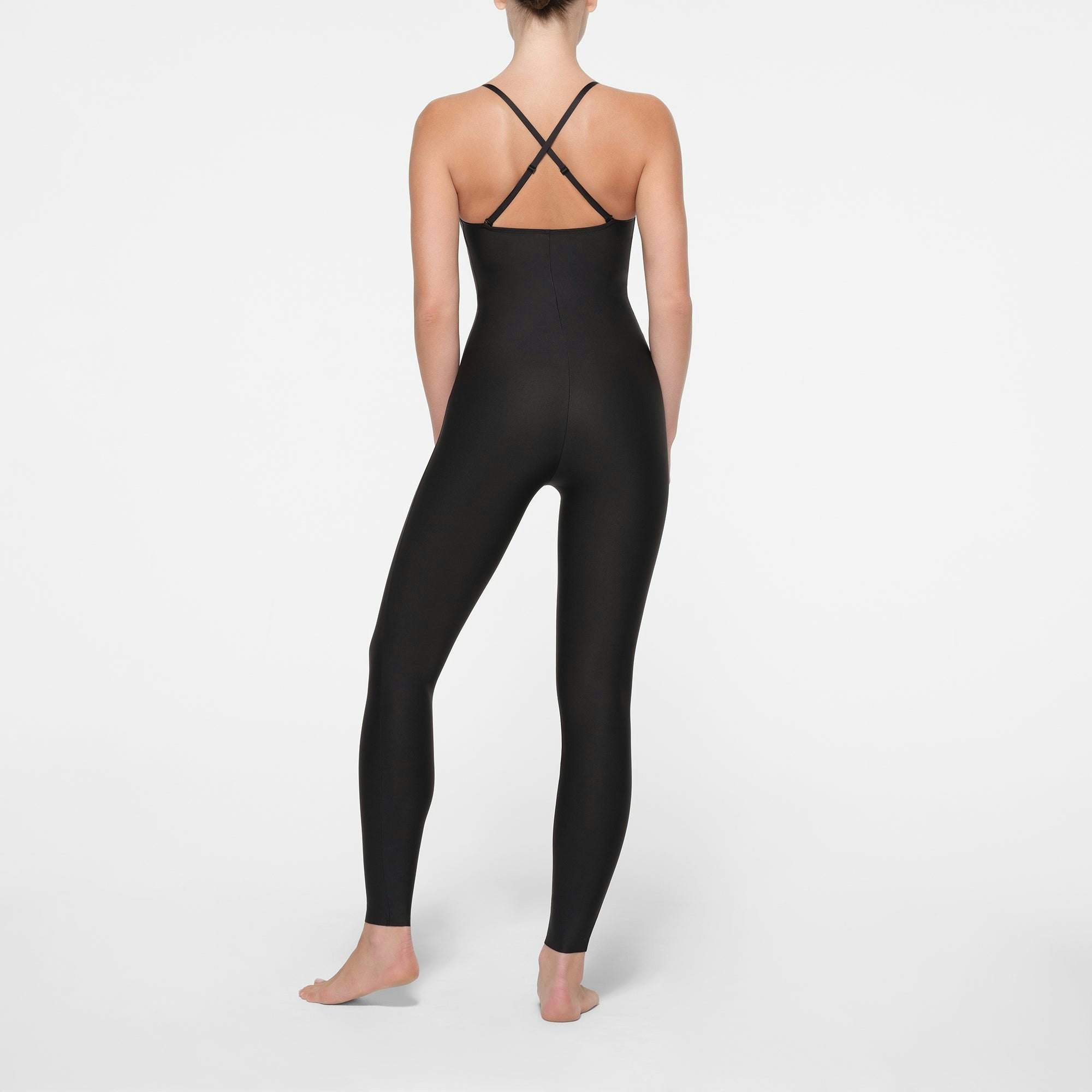 SKIMS BODY PUSH-UP CATSUIT | ONYX ON A MODEL BACK VIEW