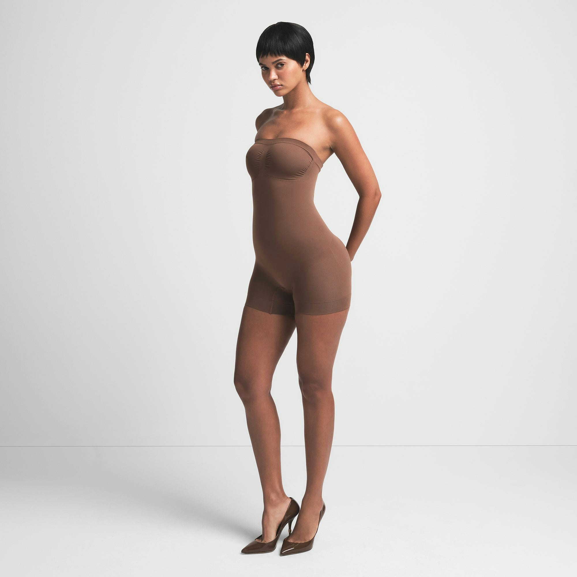 SEAMLESS SCULPT STRAPLESS SHORTIE BODYSUIT | JASPER ON A MODEL SIDE VIEW | FOCUS: 0.0, 1.0, 0.9