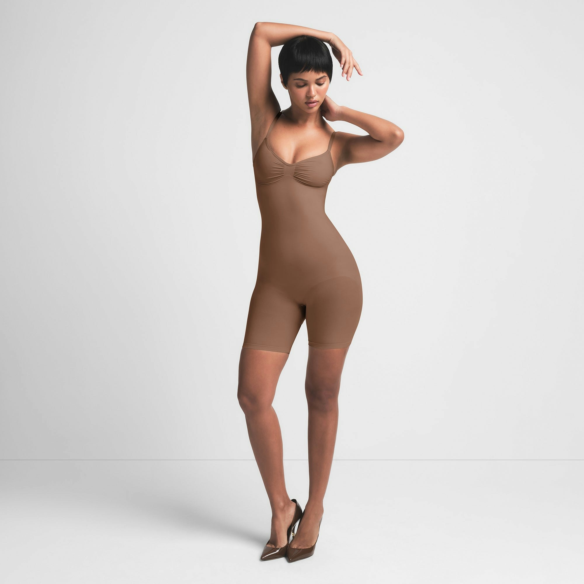 SEAMLESS SCULPT MID THIGH BODYSUIT | JASPER ON A MODEL FRONT VIEW | FOCUS: 0.0, 1.0, 0.9