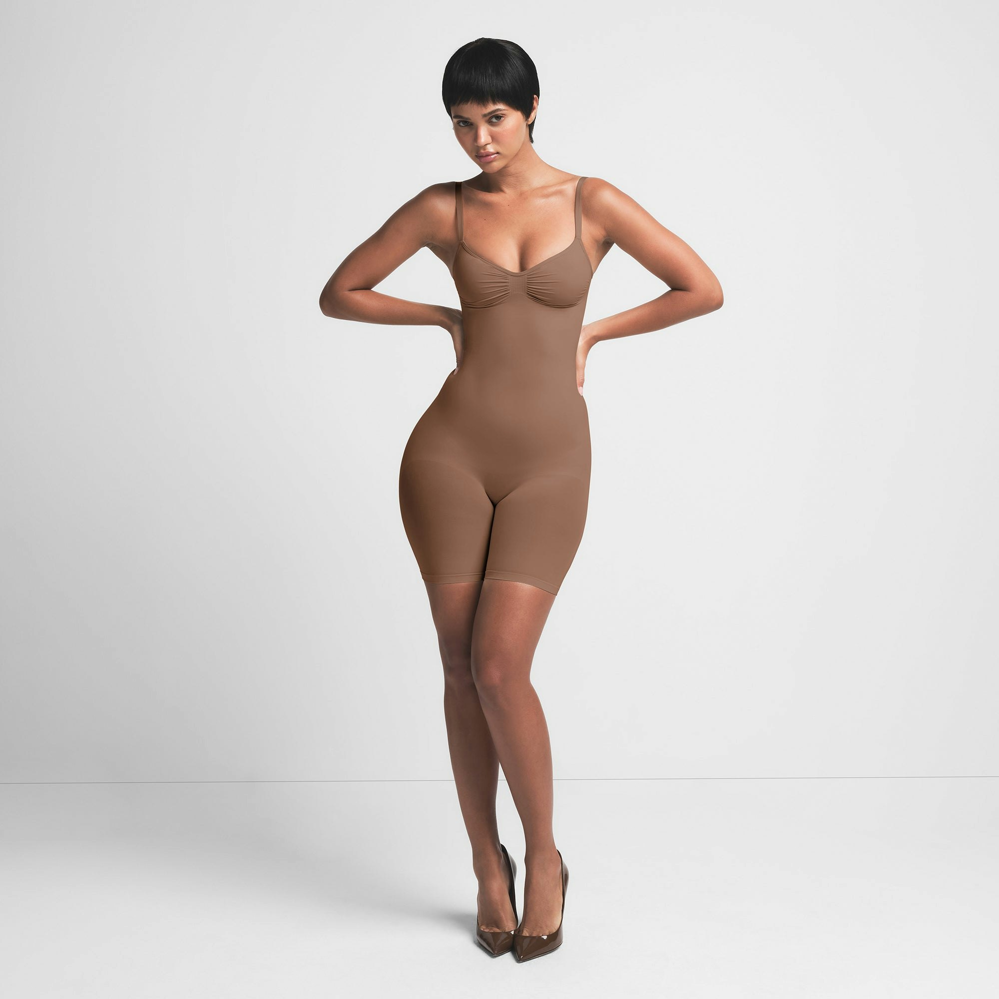 SEAMLESS SCULPT MID THIGH BODYSUIT | JASPER ON A MODEL FRONT VIEW | FOCUS: 0.0, 1.0, 0.9