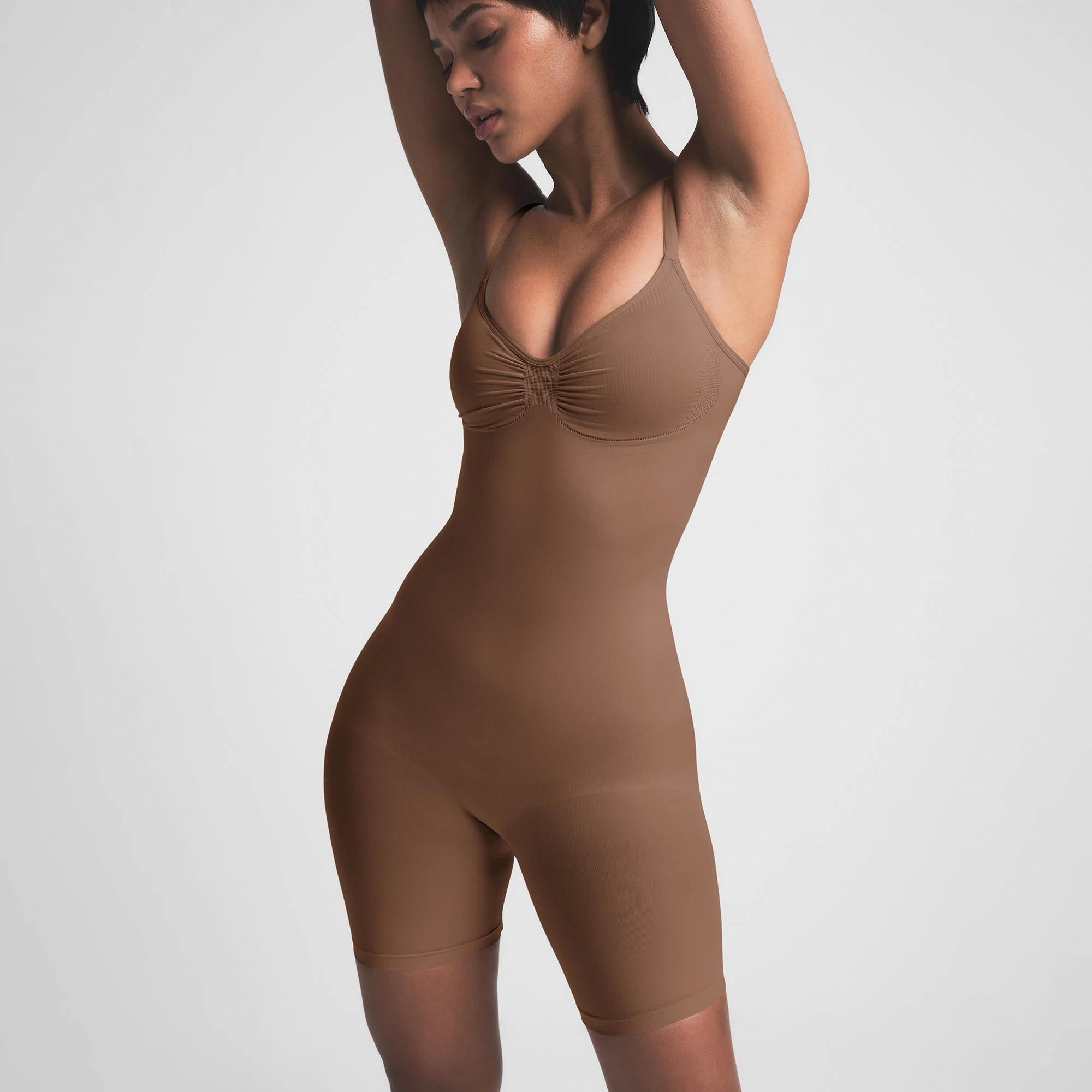 SEAMLESS SCULPT MID THIGH BODYSUIT | JASPER ON A MODEL FRONT VIEW