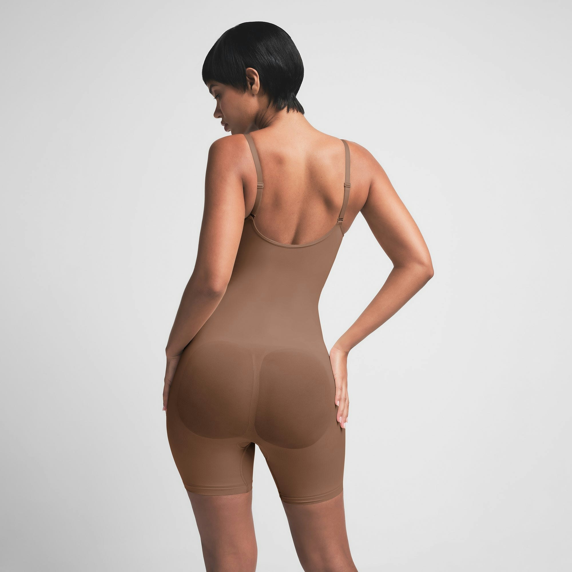 SEAMLESS SCULPT MID THIGH BODYSUIT | JASPER ON A MODEL BACK VIEW | FOCUS: 0.0, 1.0, 0.9
