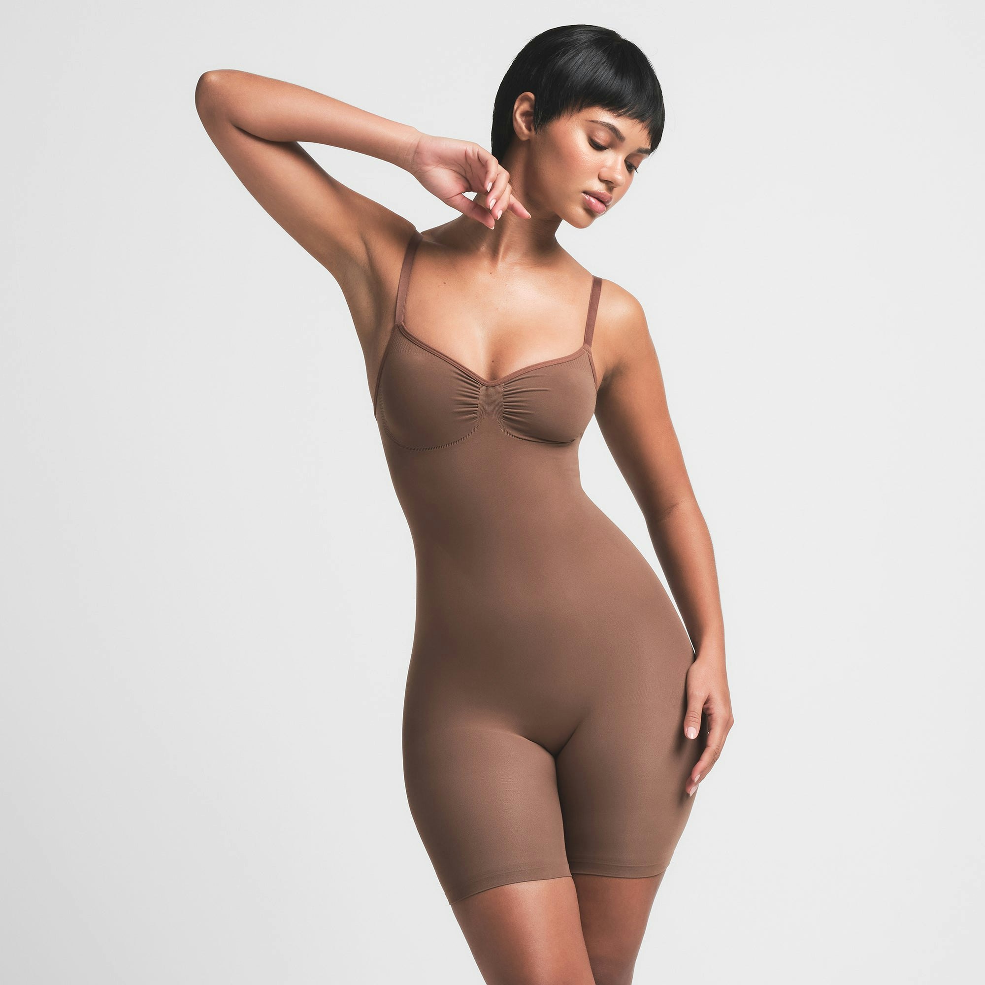 SEAMLESS SCULPT LOW BACK MID THIGH BODYSUIT | JASPER ON A MODEL FRONT VIEW | FOCUS: 0.0, 1.0, 0.9