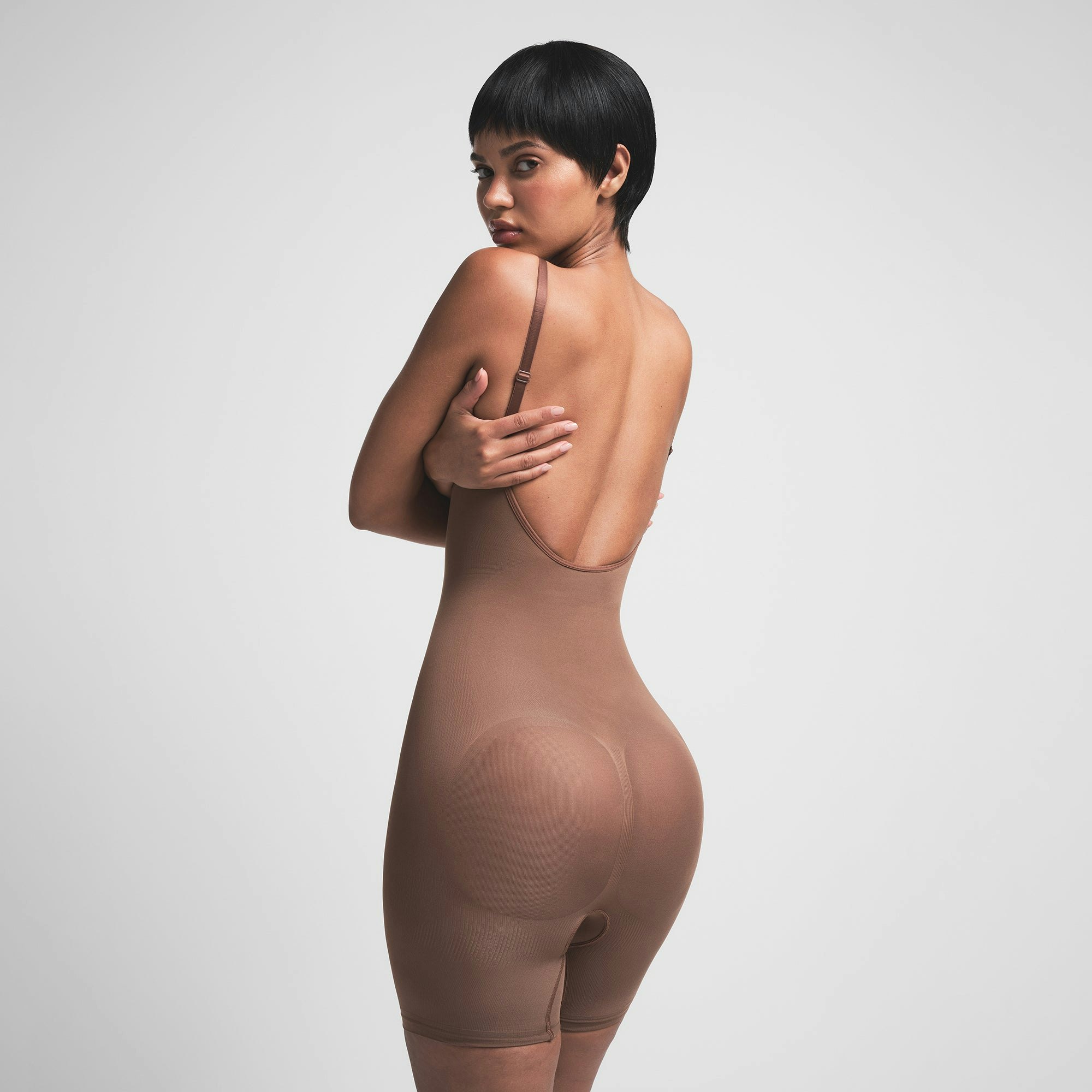 SEAMLESS SCULPT LOW BACK MID THIGH BODYSUIT | JASPER ON A MODEL BACK VIEW | FOCUS: 0.0, 1.0, 0.9