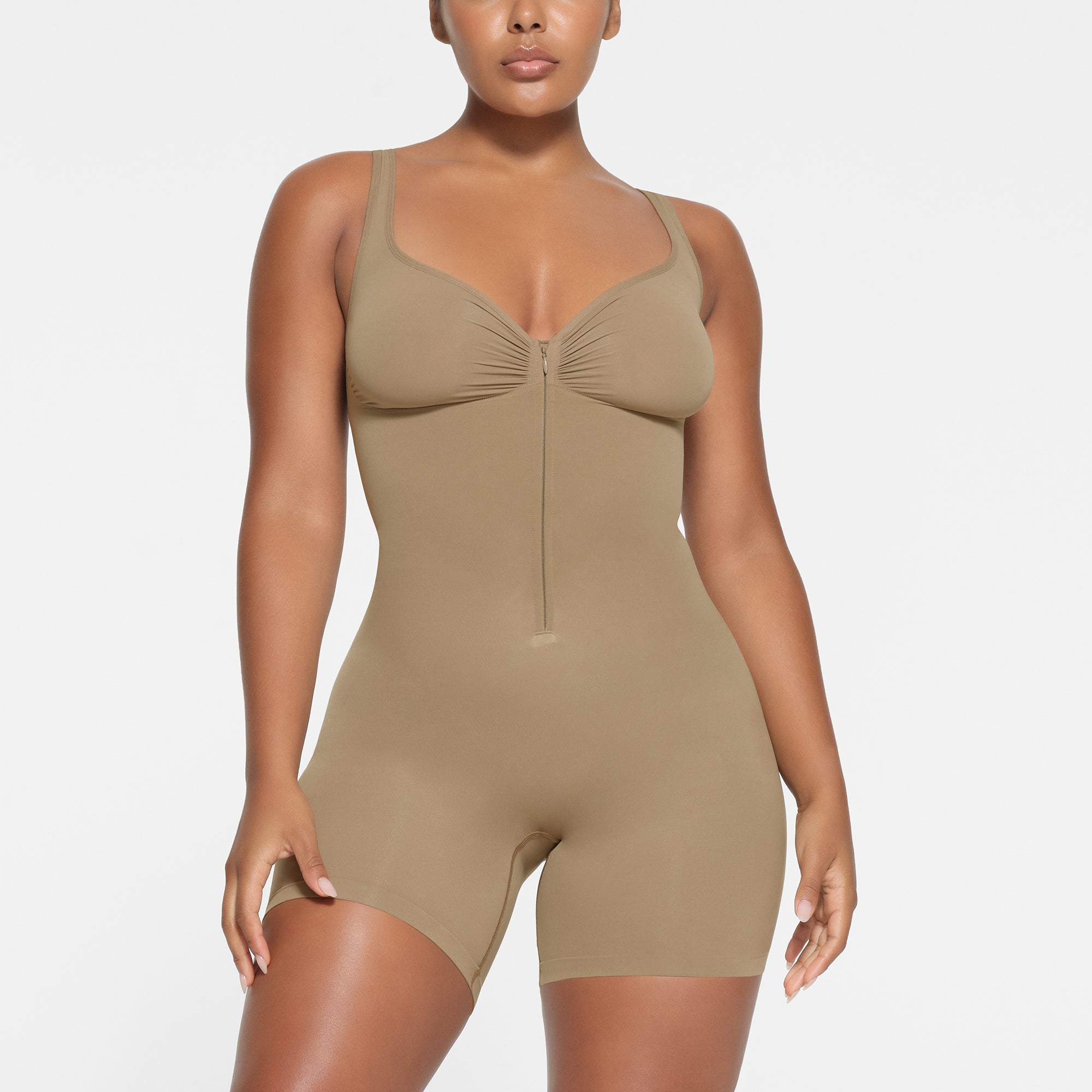 SEAMLESS SCULPT ZIP FRONT MID THIGH BODYSUIT | DESERT | XXS