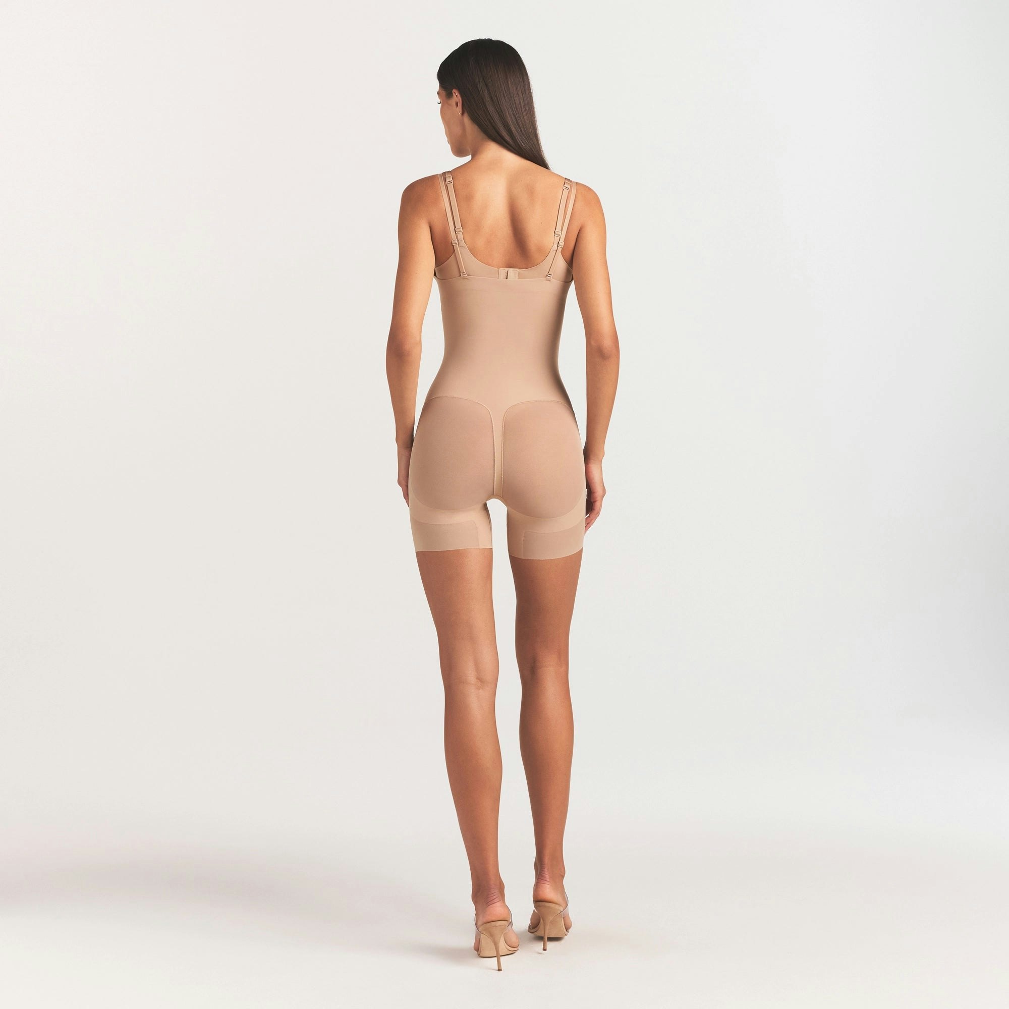 POWER MESH SHAPEWEAR CORE SCULPT OPEN BUST MID THIGH BODYSUIT | CLAY ON A MODEL FRONT VIEW @ | FOCUS: 0.0, 1.0, 0.9