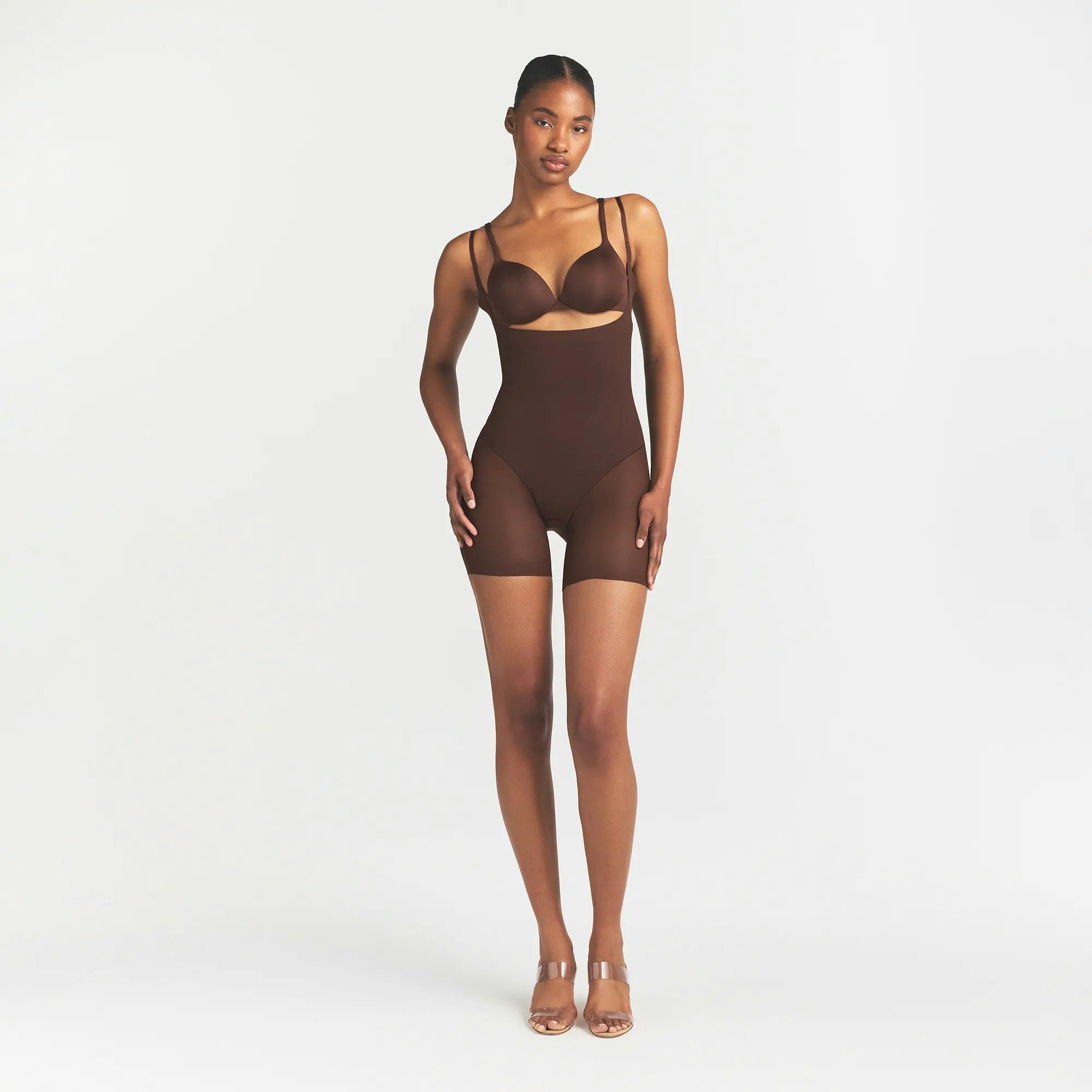 POWER MESH SHAPEWEAR CORE SCULPT OPEN BUST MID THIGH BODYSUIT | COCOA ON A MODEL FRONT VIEW @ | FOCUS: 0.0, 1.0, 0.9