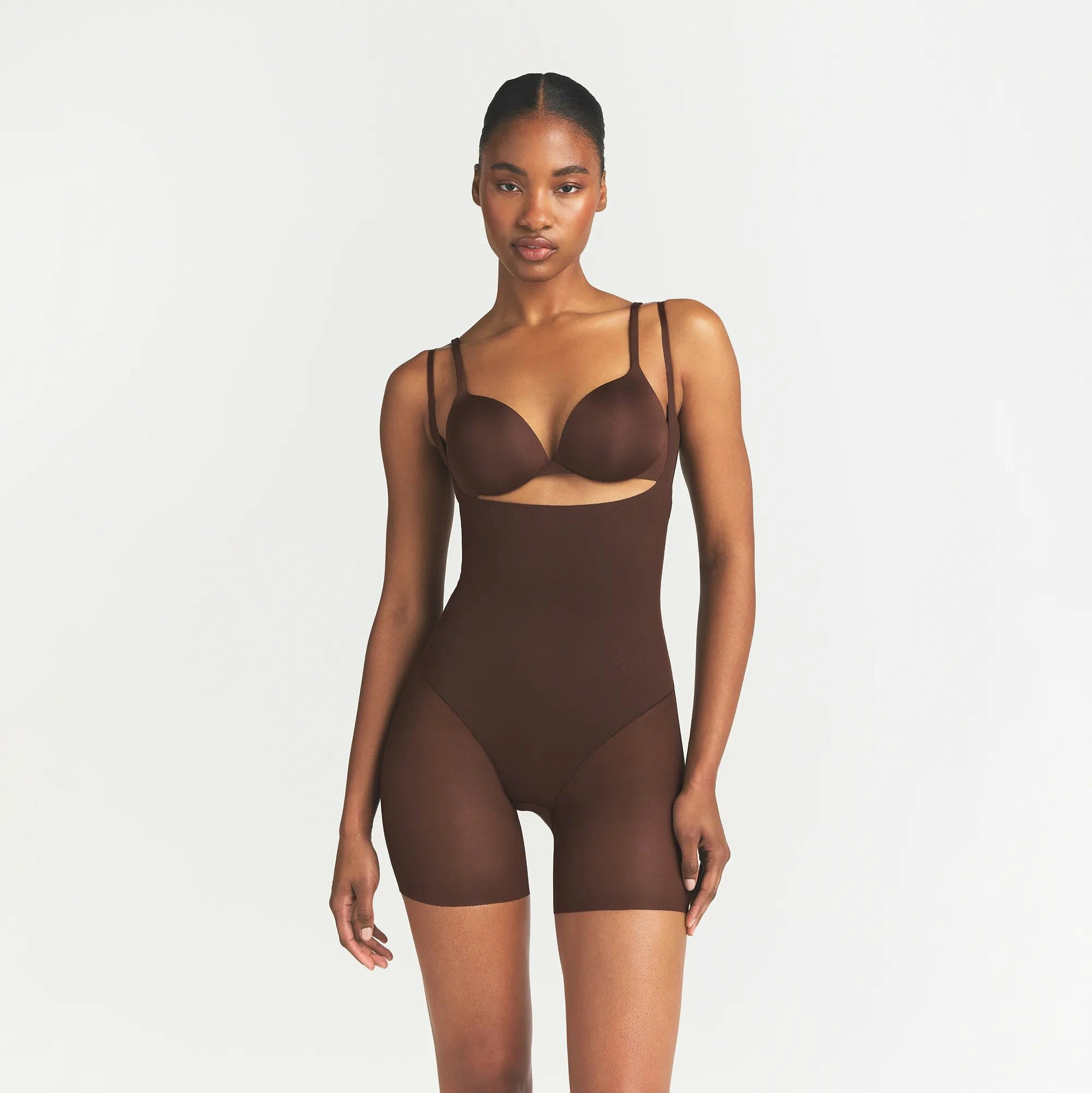 POWER MESH SHAPEWEAR CORE SCULPT OPEN BUST MID THIGH BODYSUIT | COCOA ON A MODEL FRONT VIEW @ | FOCUS: 0.0, 1.0, 0.9