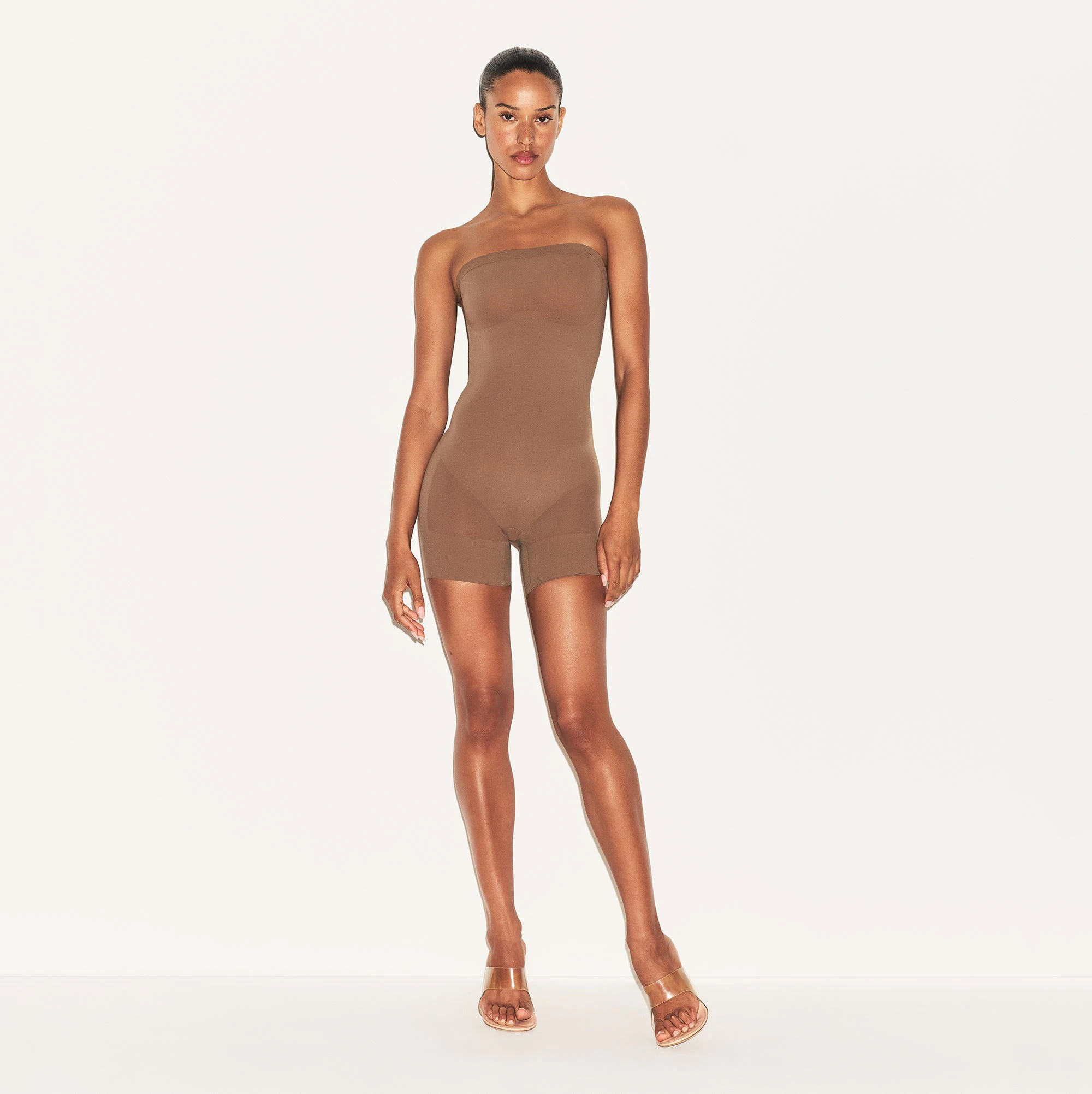 SHEER SEAMLESS STRAPLESS SHORTIE BODYSUIT | JASPER ON A MODEL FRONT VIEW | FOCUS: 0.9, 0.1, 0.7