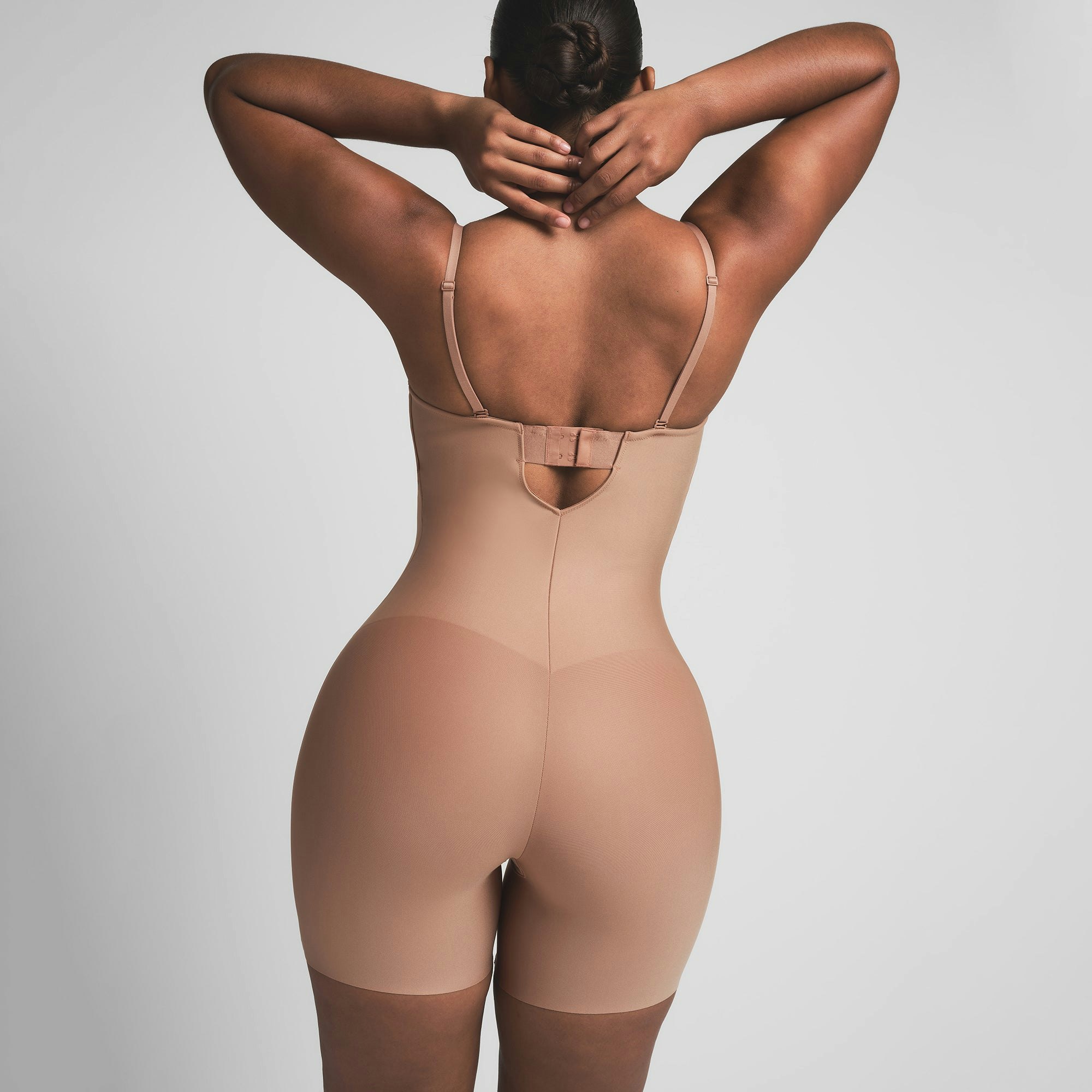 SKIMS BODY CORE SCULPT UNDERWIRE MID THIGH BODYSUIT | SIENNA ON A MODEL BACK VIEW | FOCUS: 0.0, 1.0, 0.9