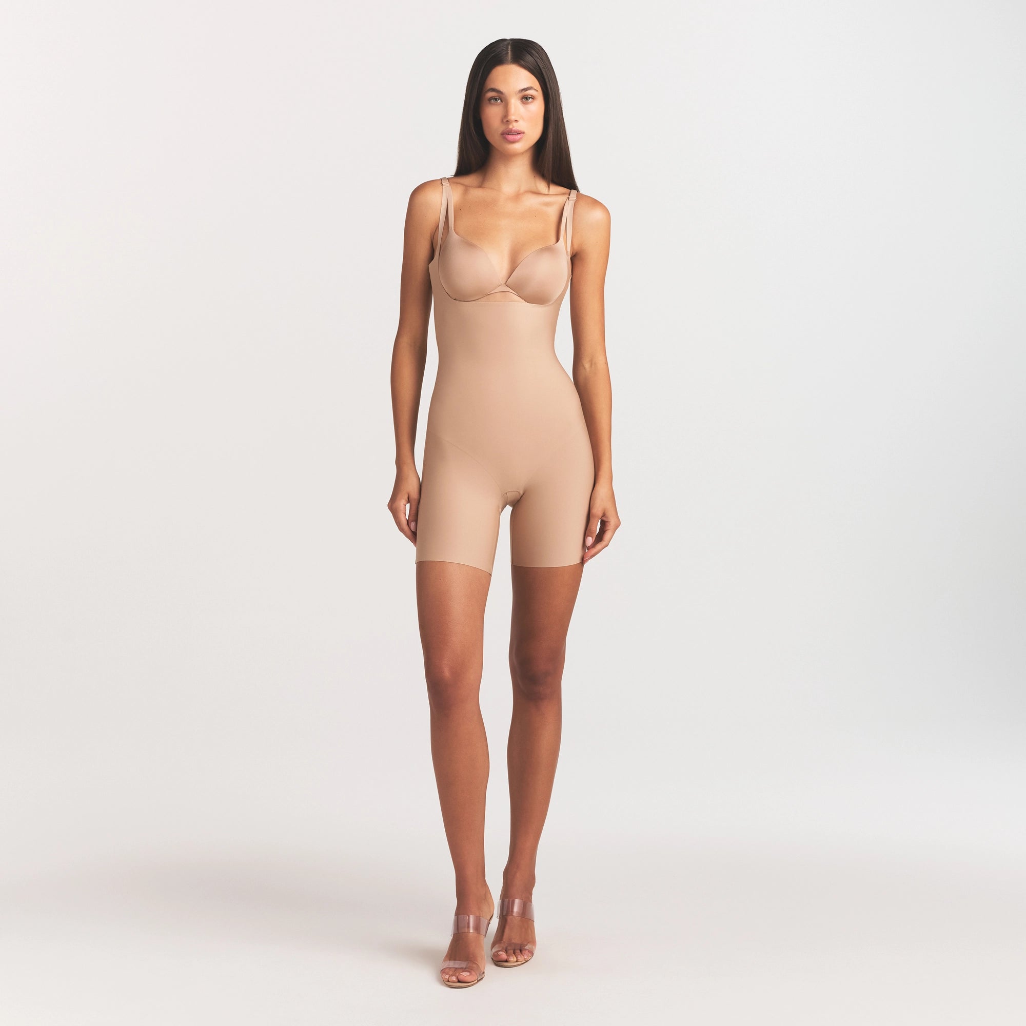 SKIMS BODY CORE SCULPT BACK SMOOTHING OPEN BUST MID THIGH BODYSUIT | CLAY ON A MODEL FRONT VIEW @ | FOCUS: 0.0, 1.0, 0.9