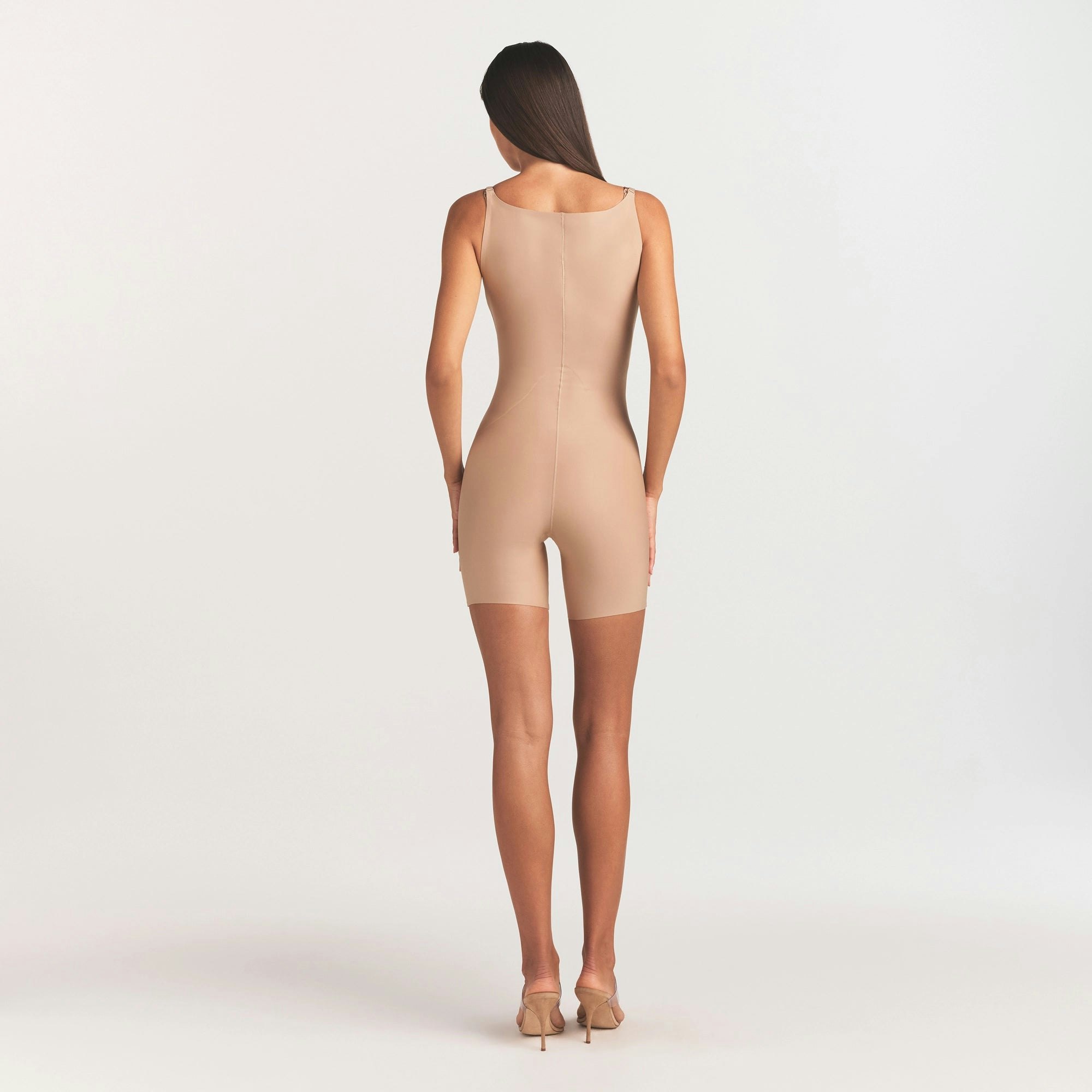 SKIMS BODY CORE SCULPT BACK SMOOTHING OPEN BUST MID THIGH BODYSUIT | CLAY ON A MODEL FRONT VIEW @ | FOCUS: 0.0, 1.0, 0.9