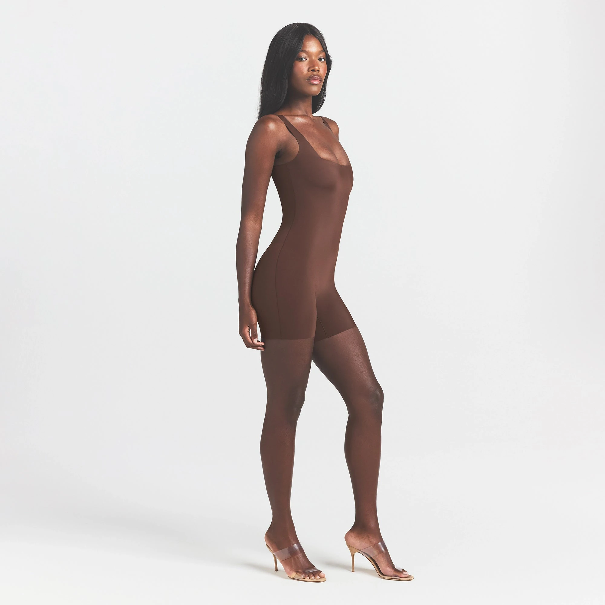 COOL SHAPEWEAR MID THIGH BODYSUIT | COCOA ON A MODEL SIDE VIEW @ | FOCUS: 0.0, 1.0, 0.9