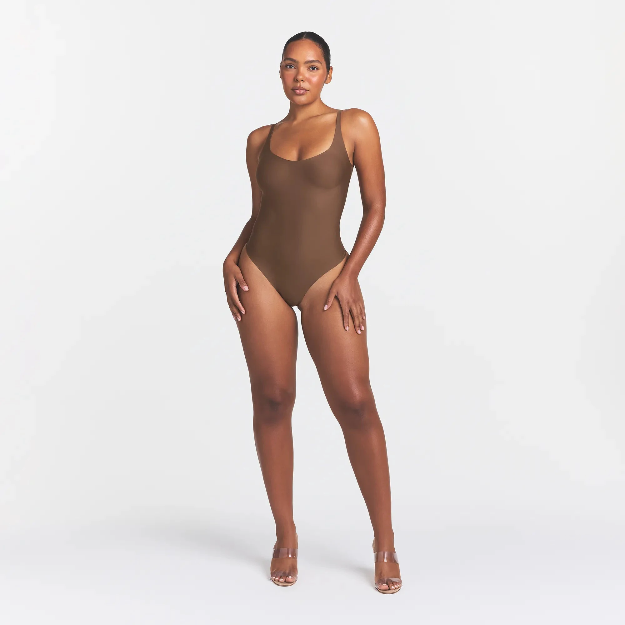 SKIMS BODY SCOOP LOW BACK THONG BODYSUIT | JASPER ON A MODEL FRONT VIEW @ | FOCUS: 0.0, 1.0, 0.9