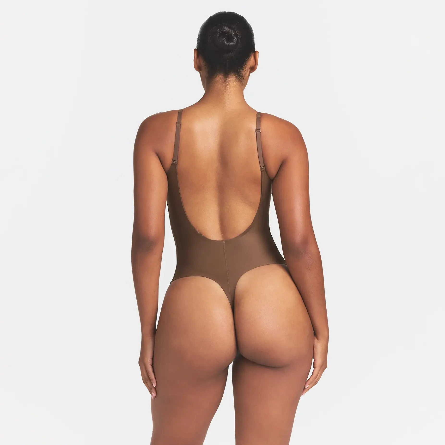 SKIMS BODY SCOOP LOW BACK THONG BODYSUIT | JASPER ON A MODEL BACK VIEW @ | FOCUS: 0.0, 1.0, 0.9