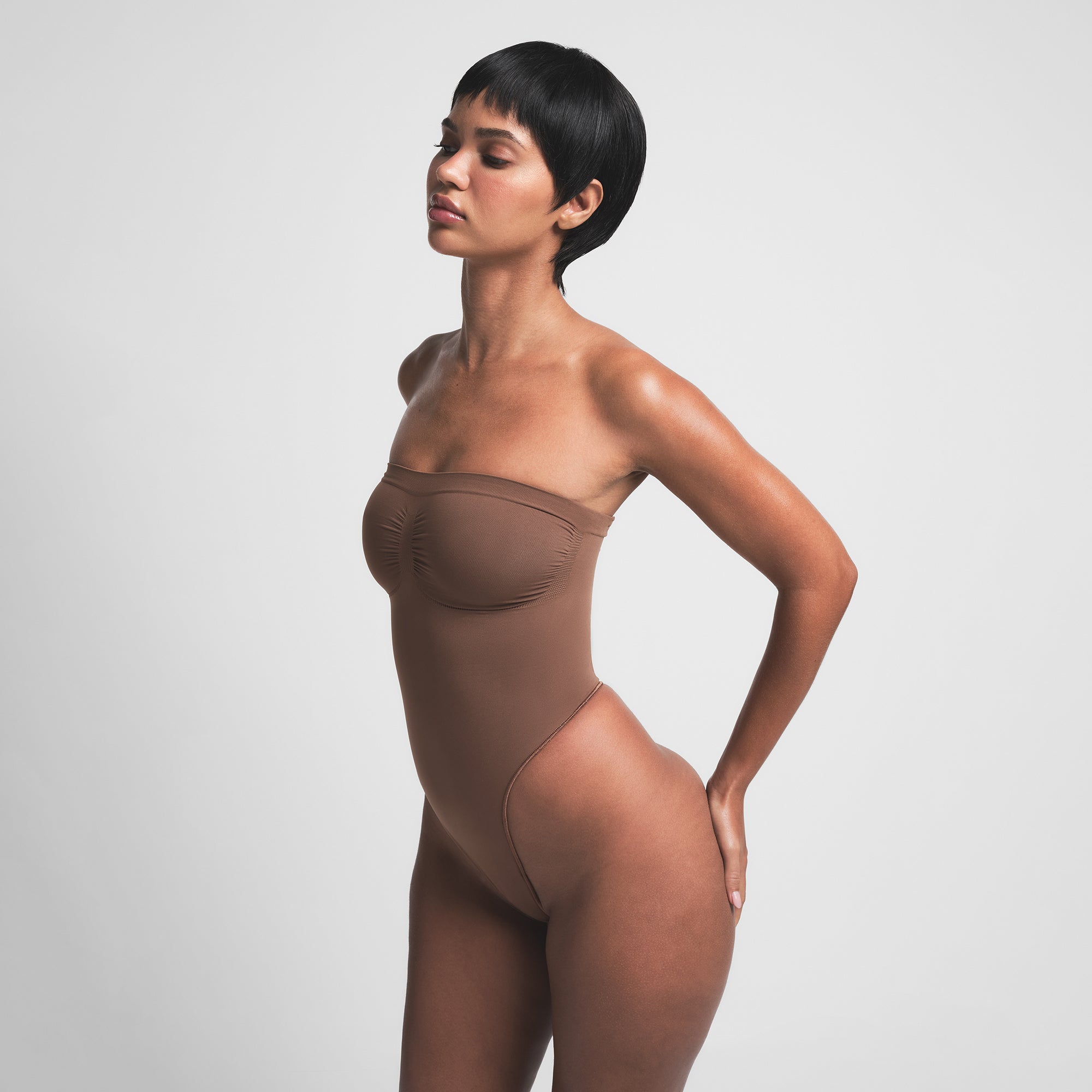 SEAMLESS SCULPT STRAPLESS THONG BODYSUIT | JASPER