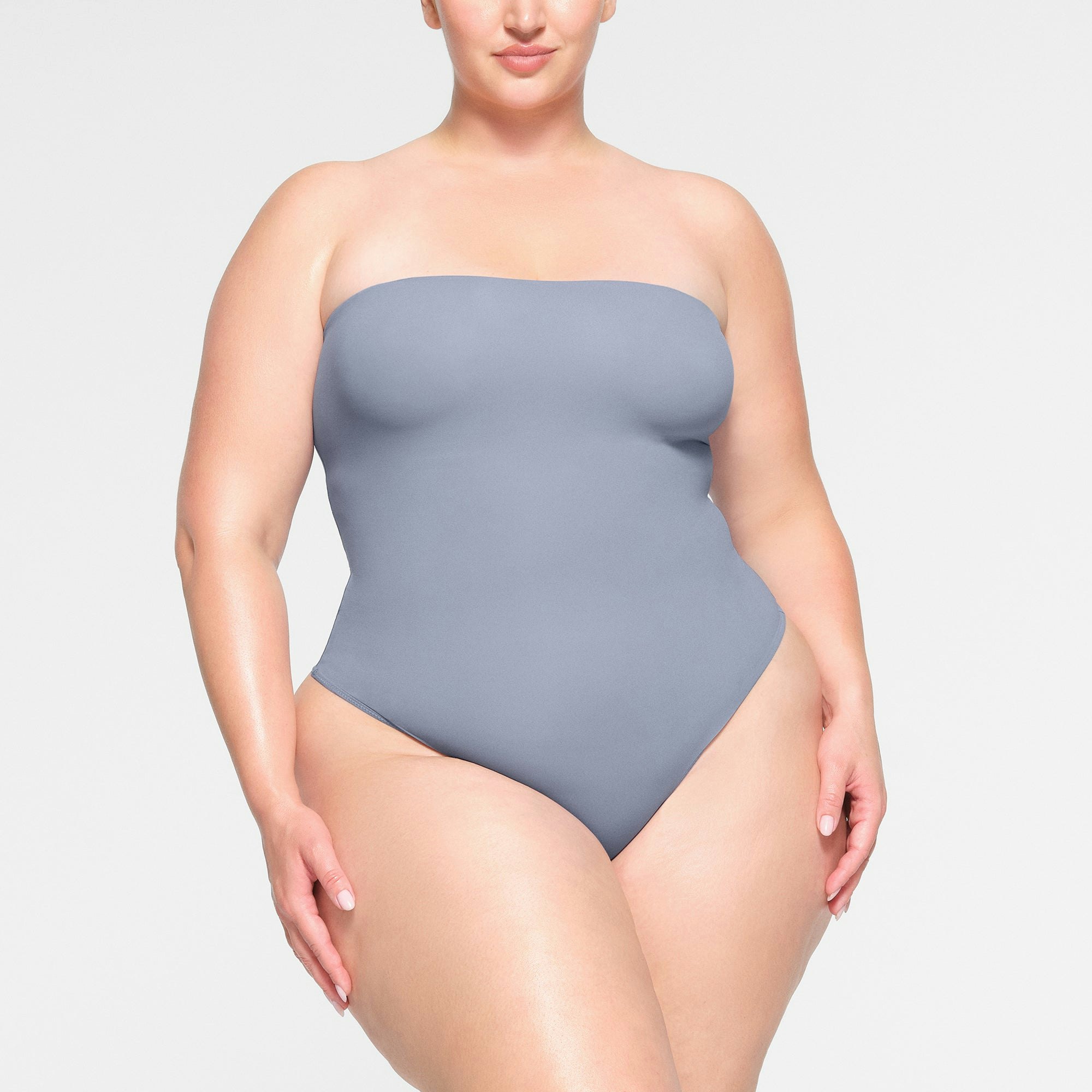 FITS EVERYBODY STRAPLESS BODYSUIT WORN BY A MODEL IN FRONT VIEW