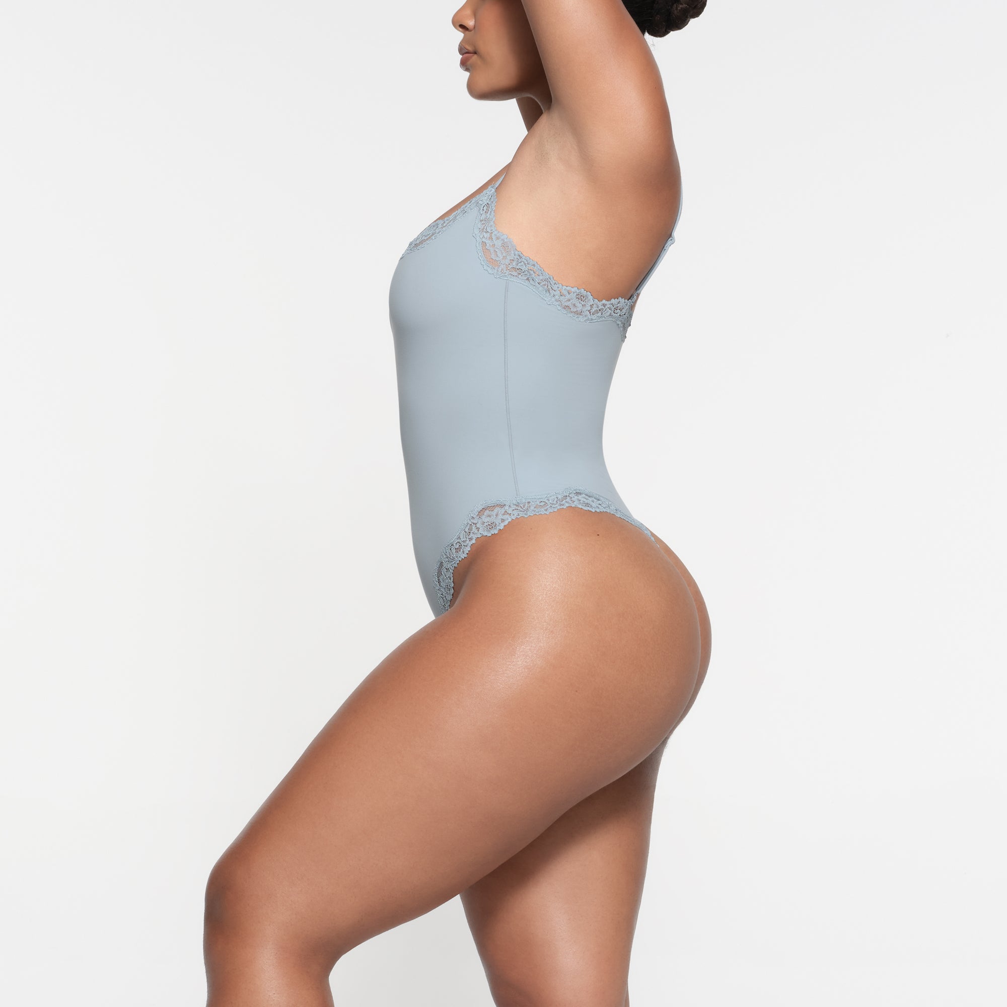 FITS EVERYBODY LACE CAMI BODYSUIT | DENIM ON A MODEL SIDE VIEW