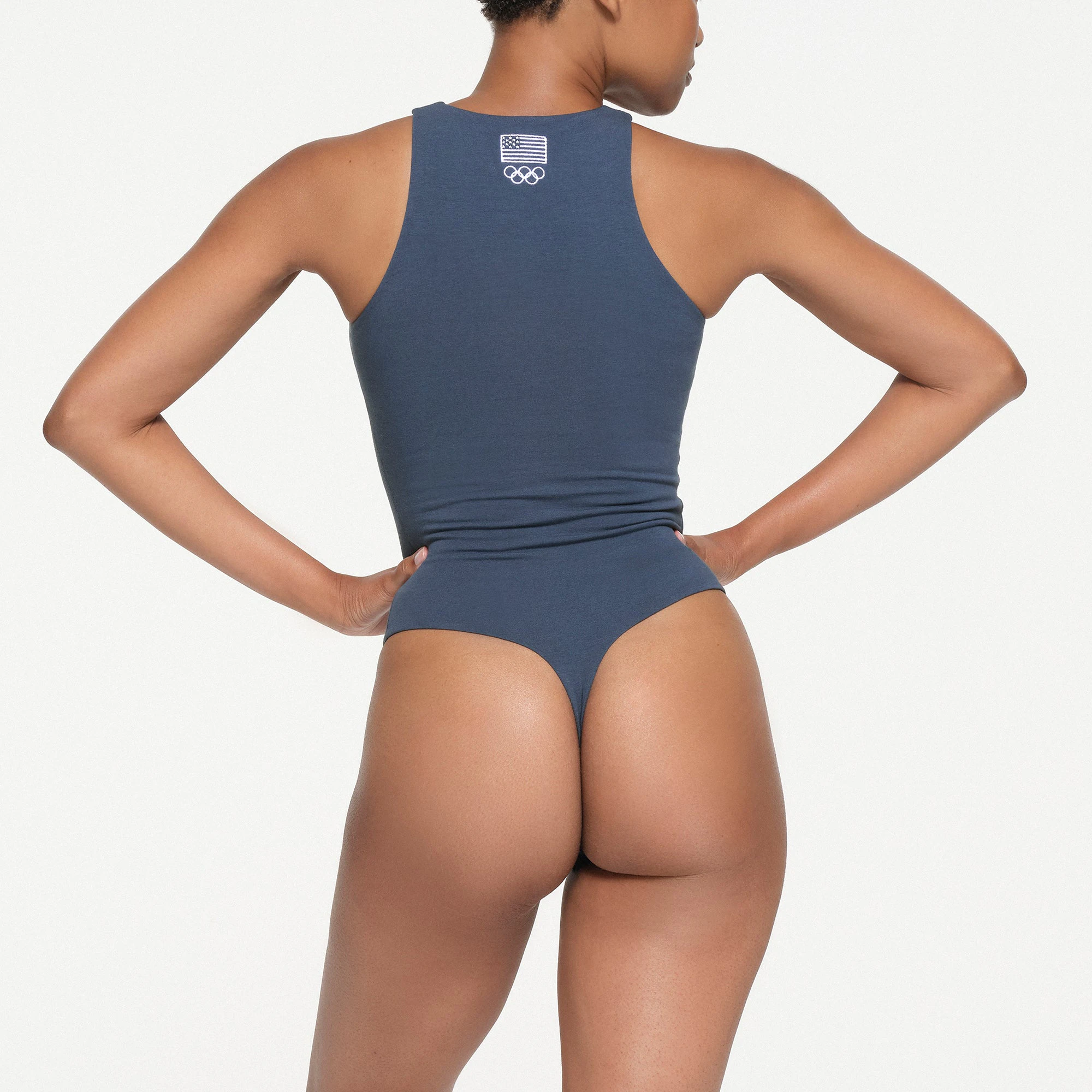SKIMS FOR TEAM USA COTTON JERSEY OLYMPIC HIGH NECK BODYSUIT | NAVY ON A MODEL BACK VIEW