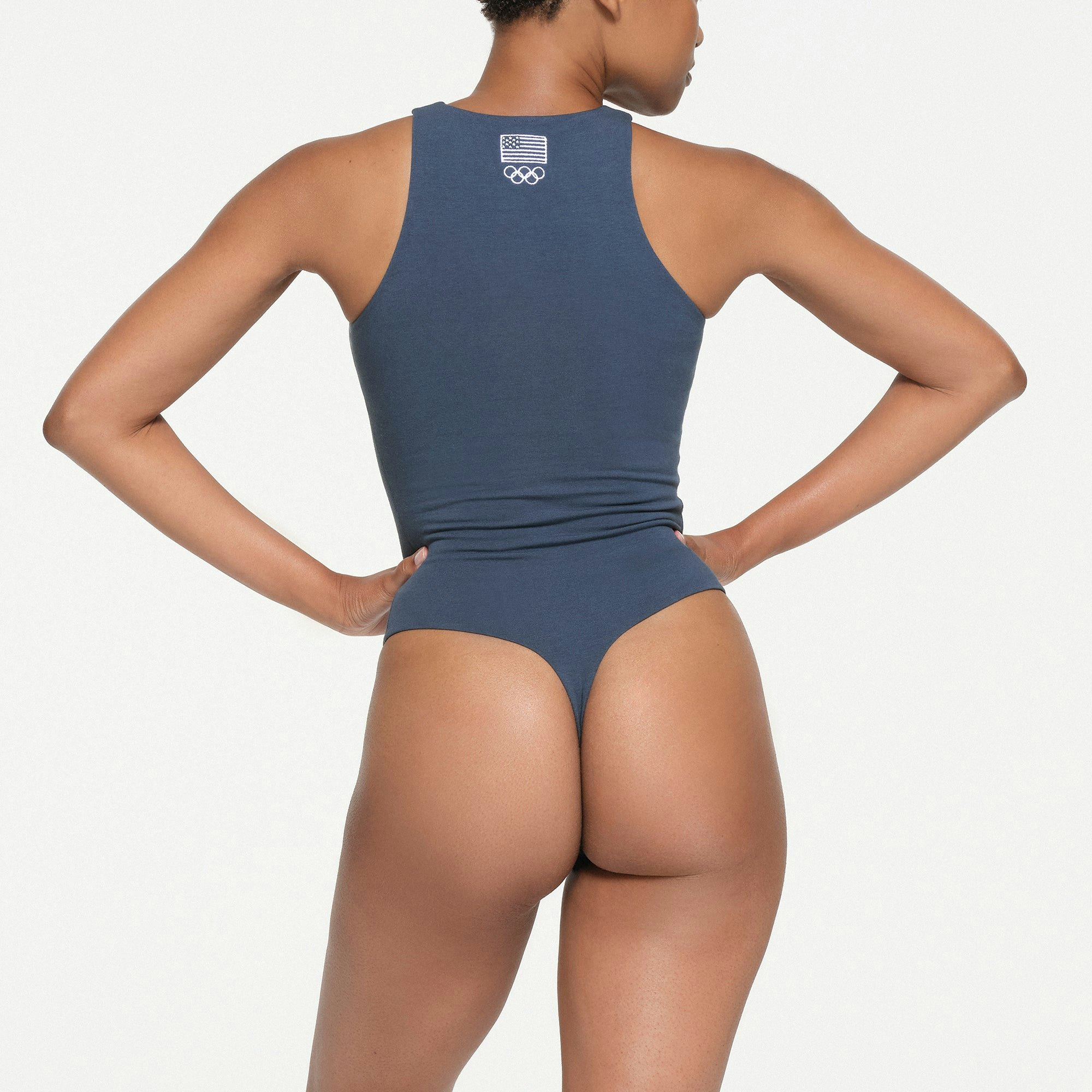 SKIMS FOR TEAM USA COTTON JERSEY OLYMPIC HIGH NECK BODYSUIT | NAVY ON A MODEL BACK VIEW