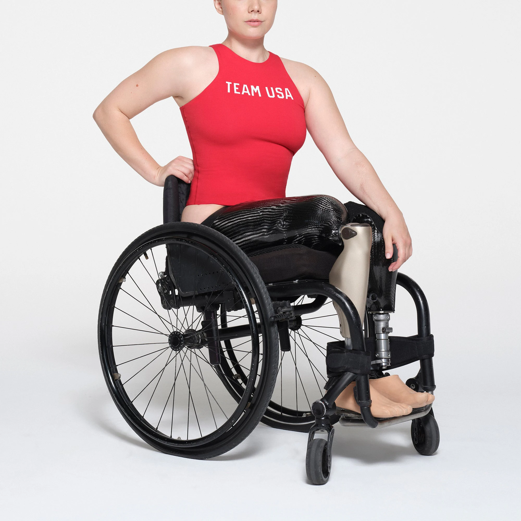 SKIMS FOR TEAM USA COTTON JERSEY PARALYMPIC HIGH NECK BODYSUIT | RED ON A MODEL SIDE VIEW