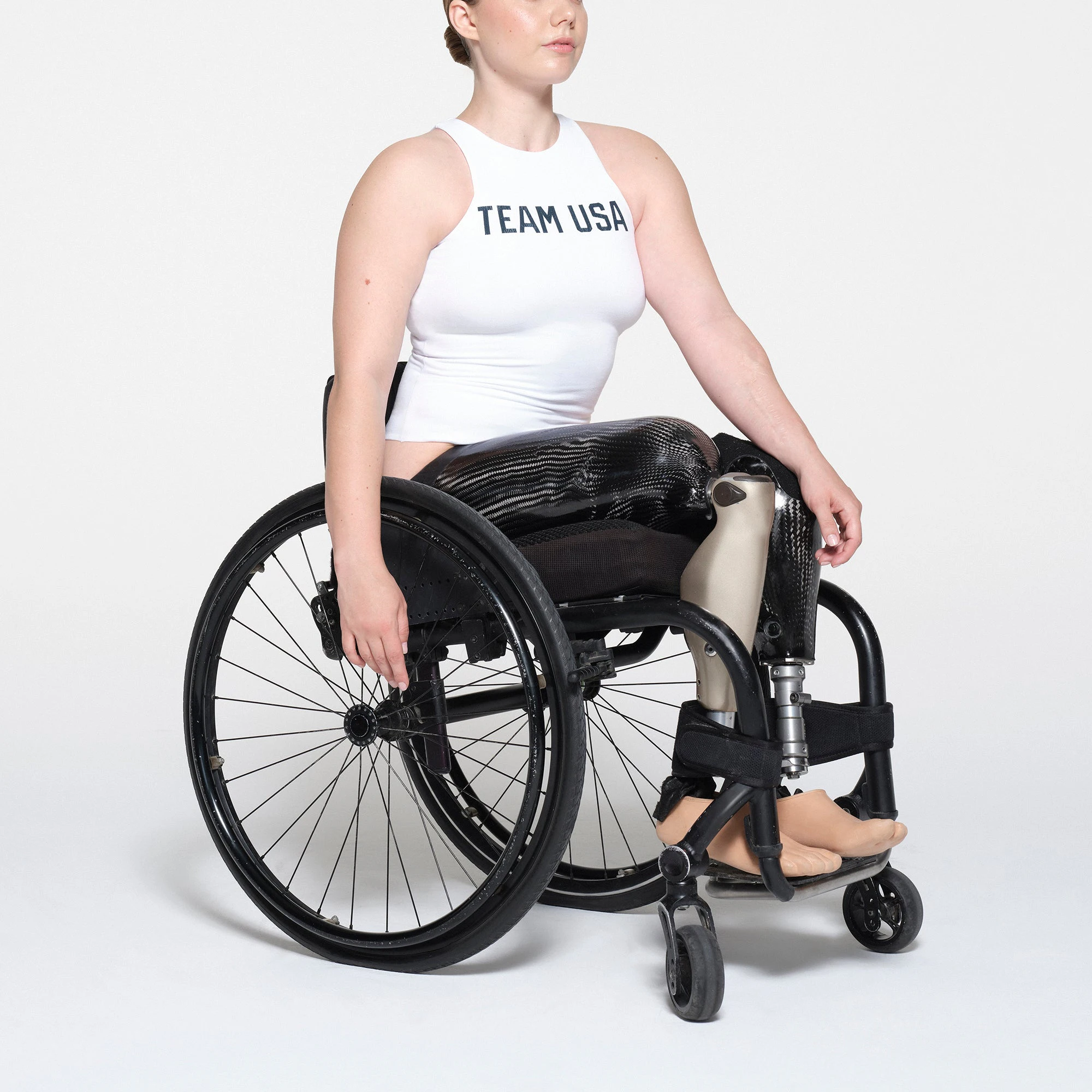 SKIMS FOR TEAM USA COTTON JERSEY PARALYMPIC HIGH NECK BODYSUIT | WHITE ON A MODEL SIDE VIEW