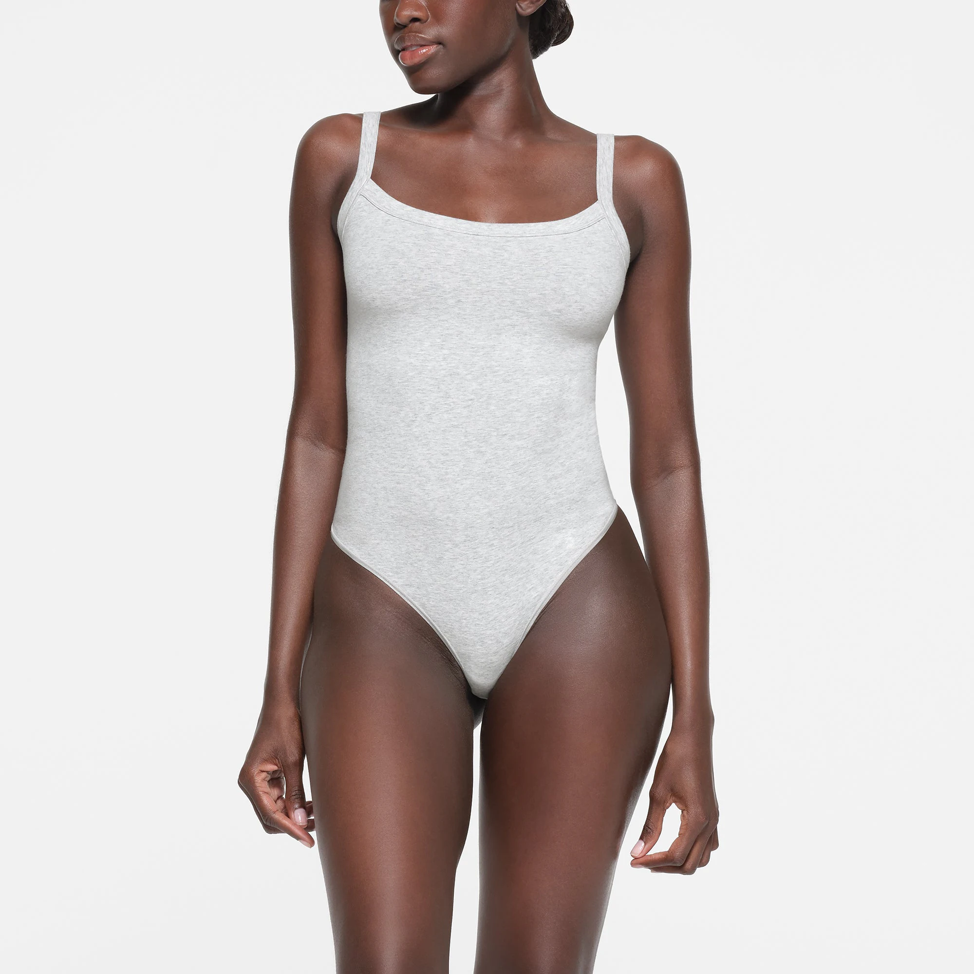 COTTON JERSEY SCOOP NECK BODYSUIT | LIGHT HEATHER GREY ON A MODEL FRONT VIEW