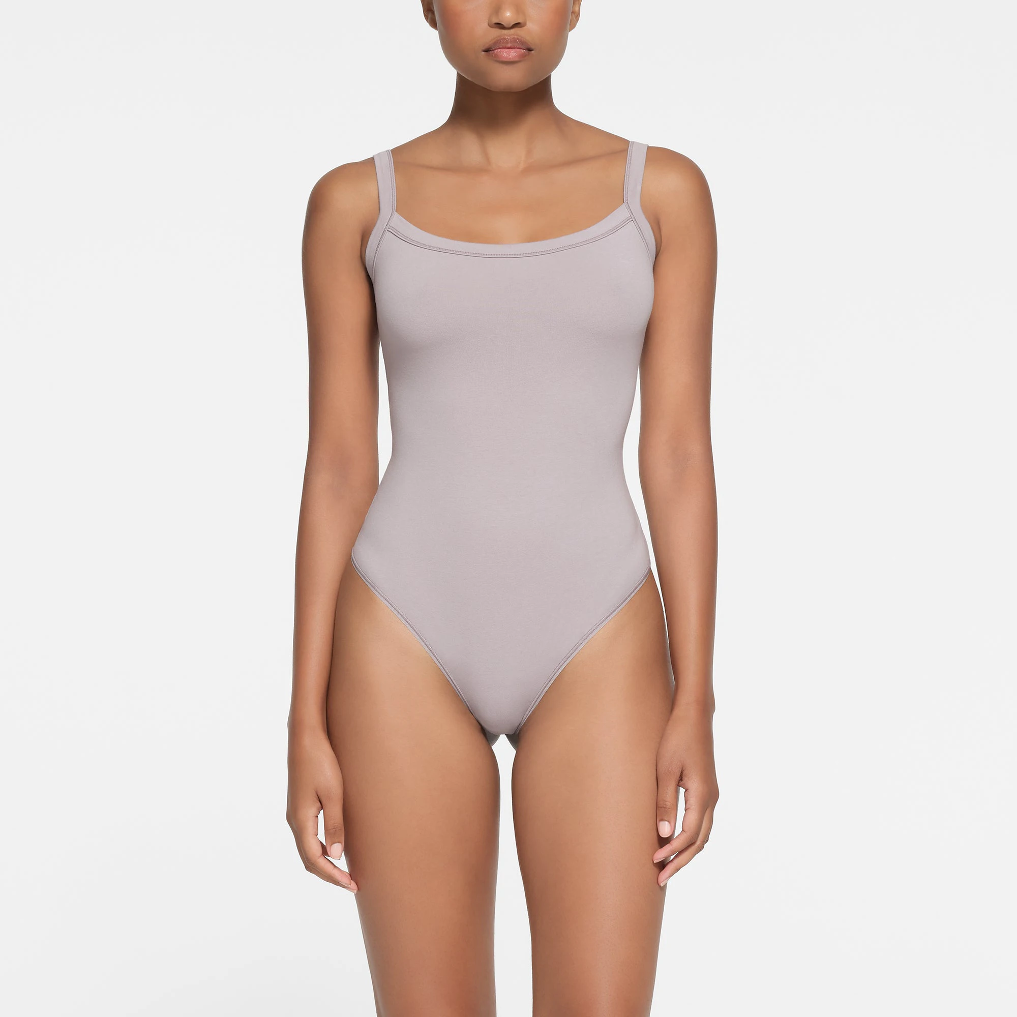 COTTON JERSEY SCOOP NECK BODYSUIT | OYSTER ON A MODEL FRONT VIEW