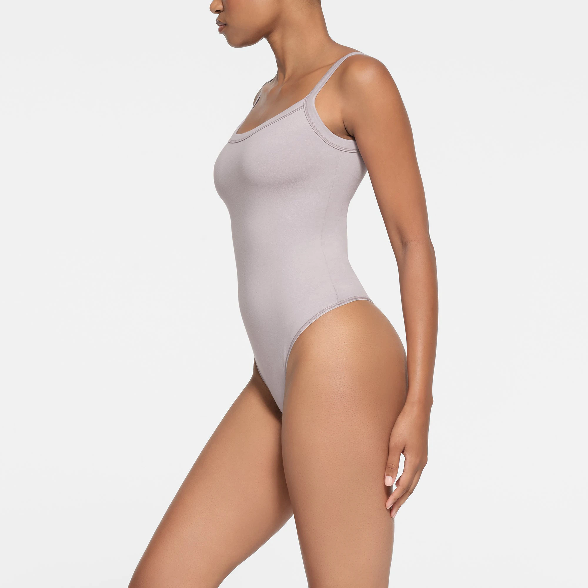 COTTON JERSEY SCOOP NECK BODYSUIT | OYSTER ON A MODEL SIDE VIEW