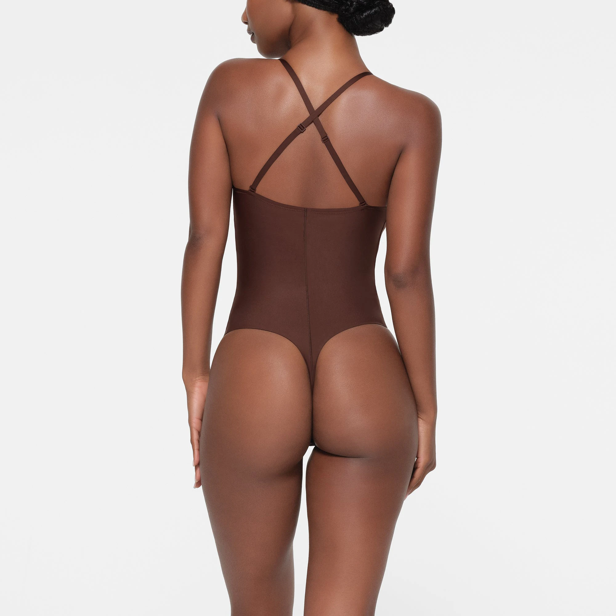 SKIMS BODY PUSH-UP THONG BODYSUIT | COCOA ON A MODEL BACK VIEW