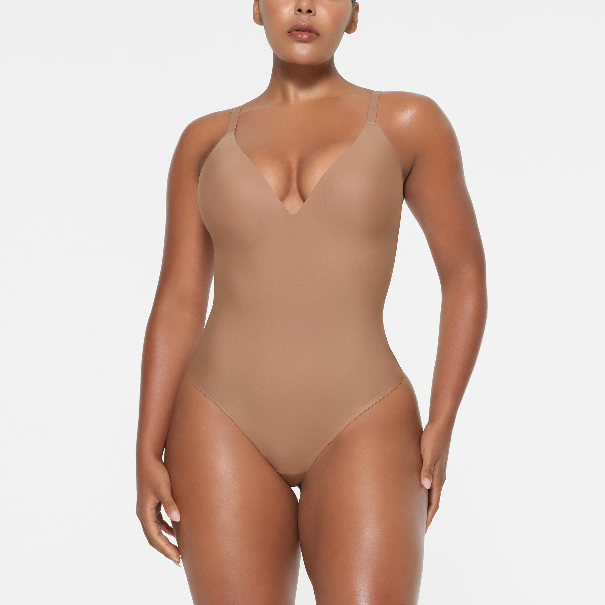 SKIMS BODY PUSH-UP THONG BODYSUIT | SIENNA ON A MODEL FRONT VIEW
