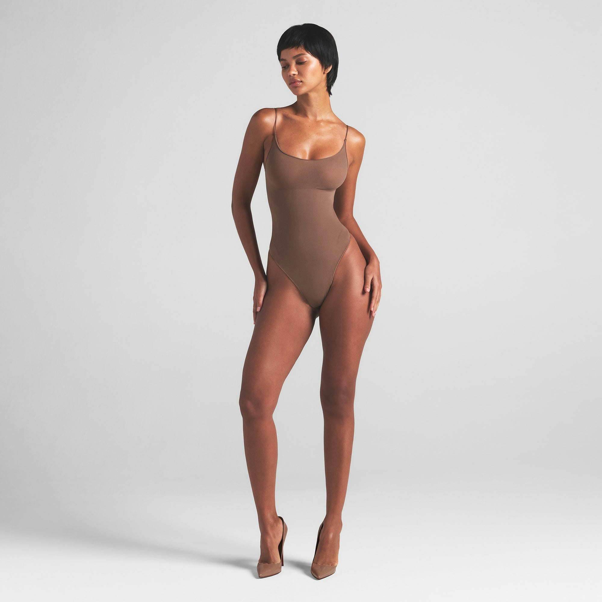 SHEER SEAMLESS THONG BODYSUIT | JASPER ON A MODEL FRONT VIEW | FOCUS: 0.0, 1.0, 0.9
