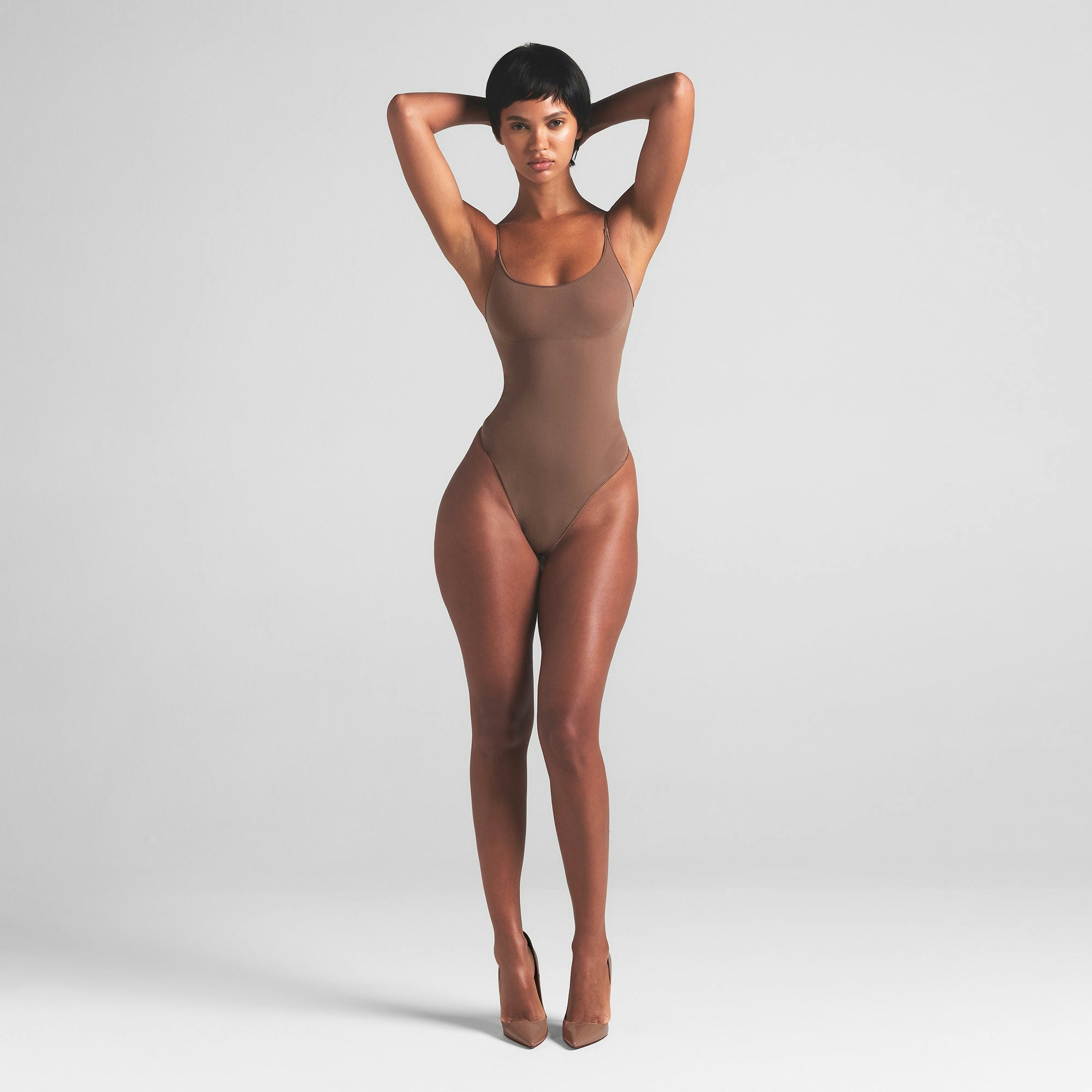 SHEER SEAMLESS THONG BODYSUIT | JASPER ON A MODEL FRONT VIEW | FOCUS: 0.0, 1.0, 0.9